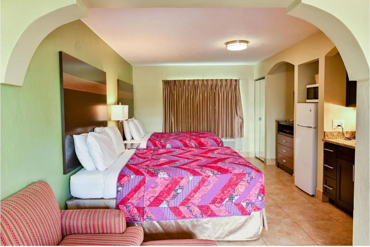 Photo of the whole room, Bed in Oceans Beach Resort & Suites