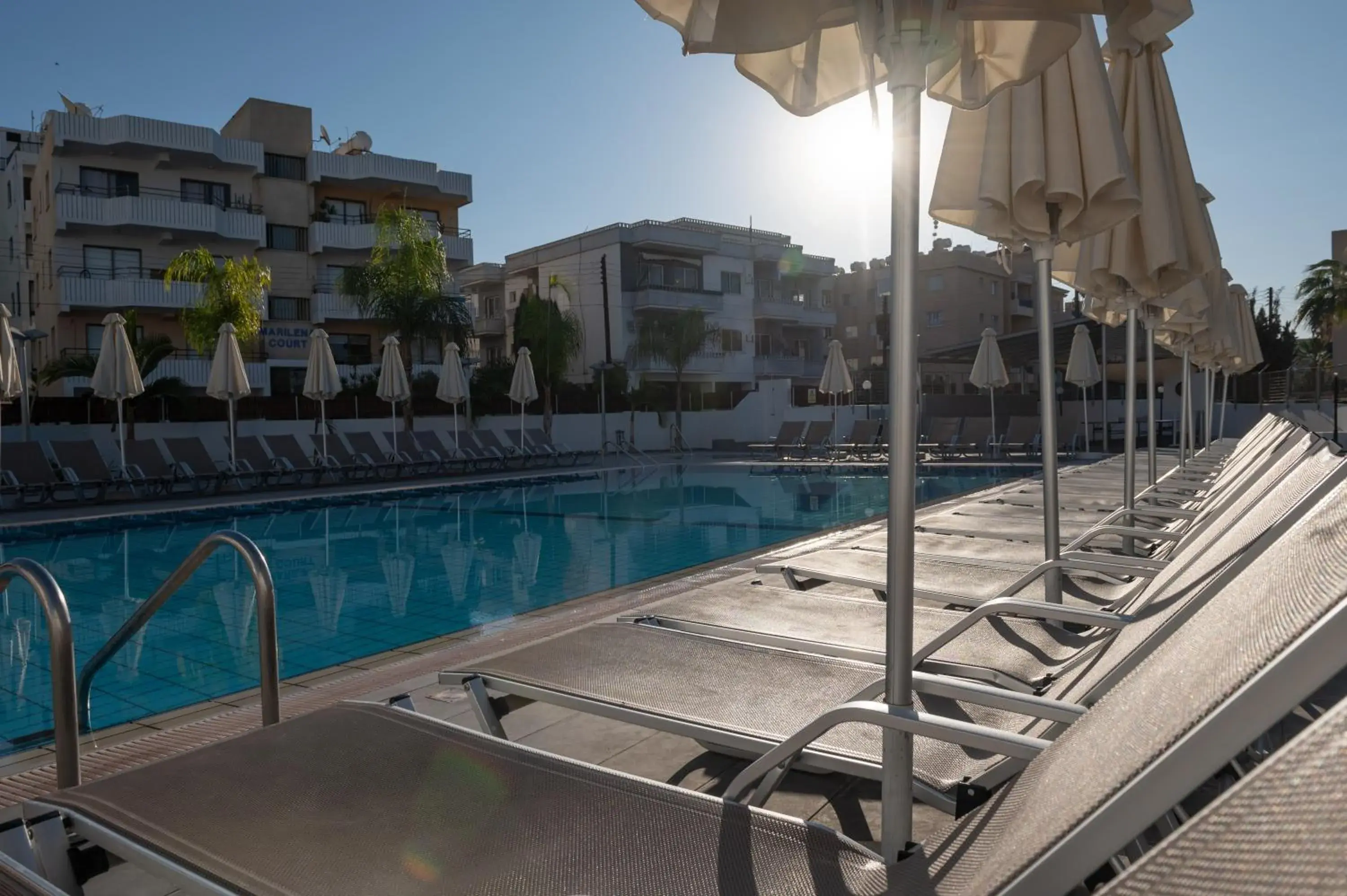 Pool view in Kefalos Damon Hotel Apartments Pool view in Kefalos Damon Hotel Apartments