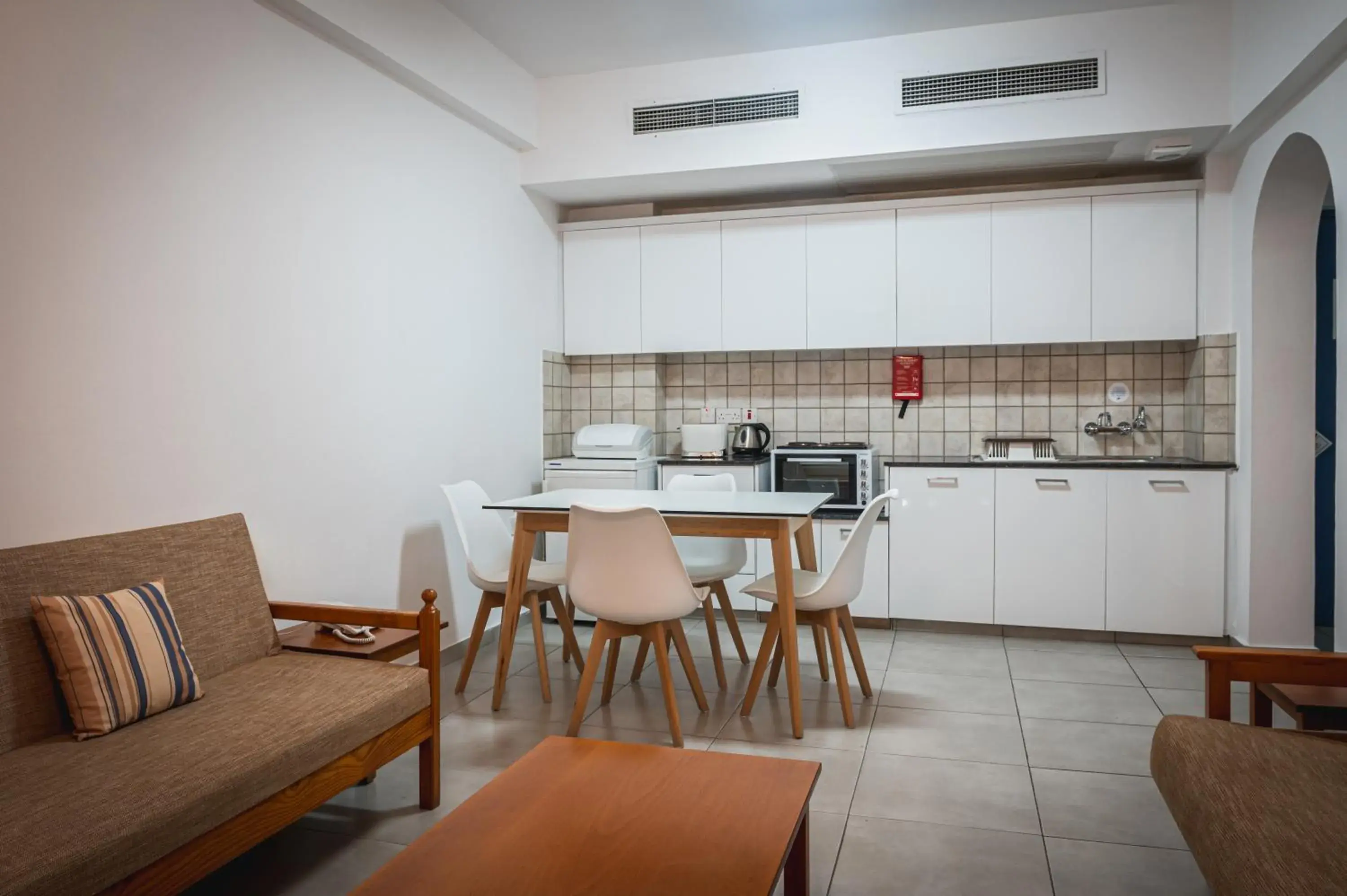 Living room in Kefalos Damon Hotel Apartments Living room in Kefalos Damon Hotel Apartments