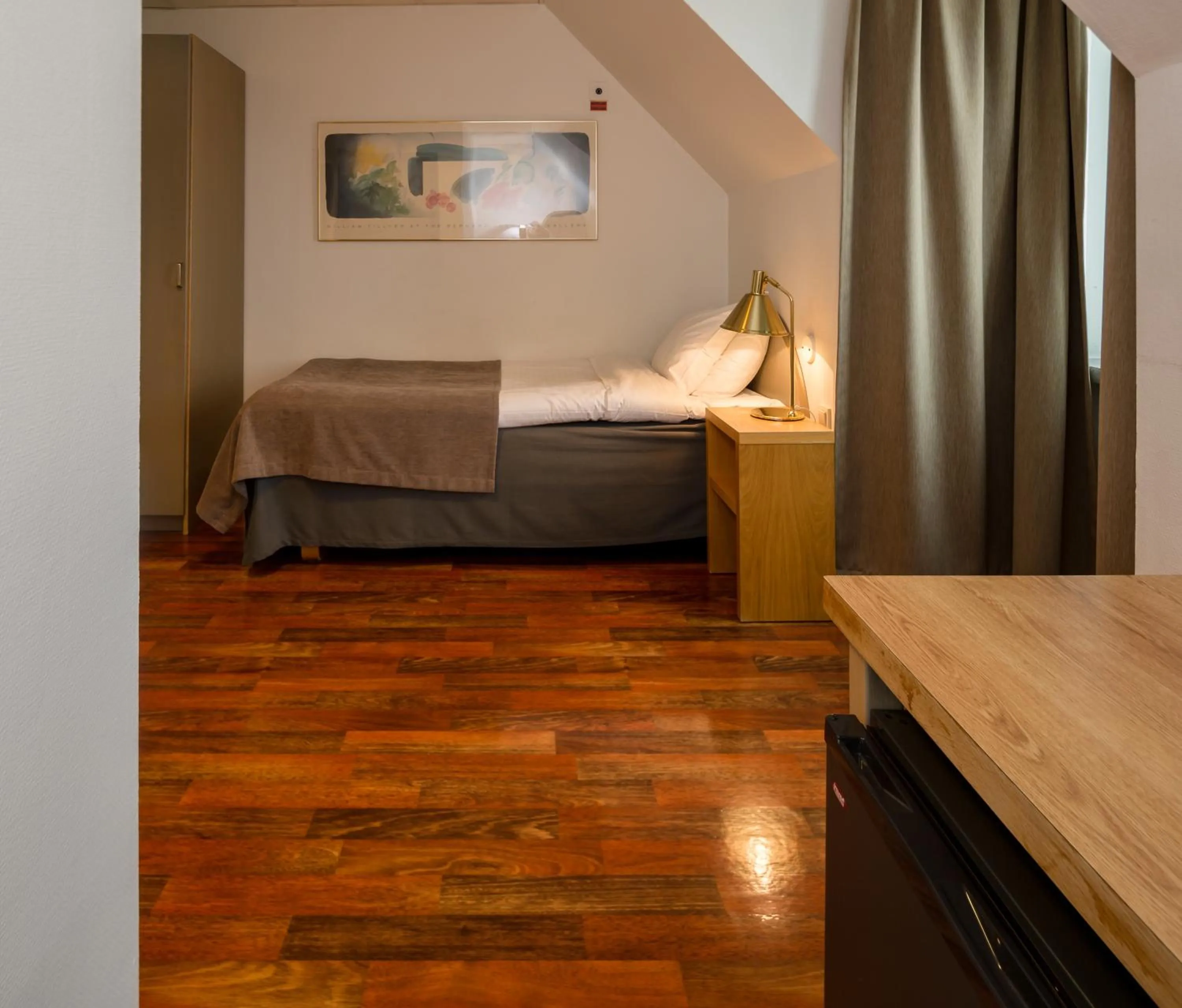 Photo of the whole room, Bed in Grand Hotel Falkenberg