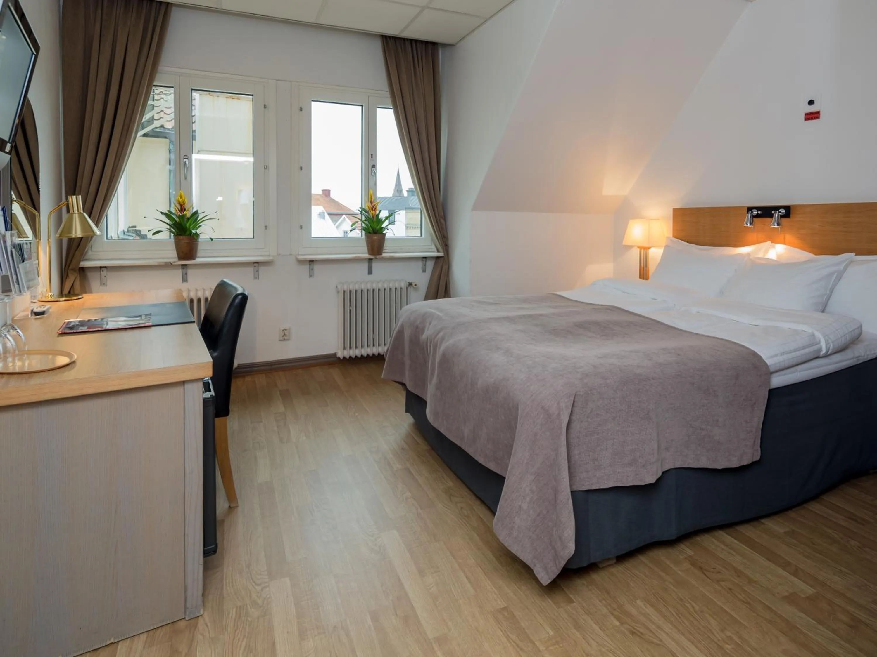 Photo of the whole room, Bed in Grand Hotel Falkenberg