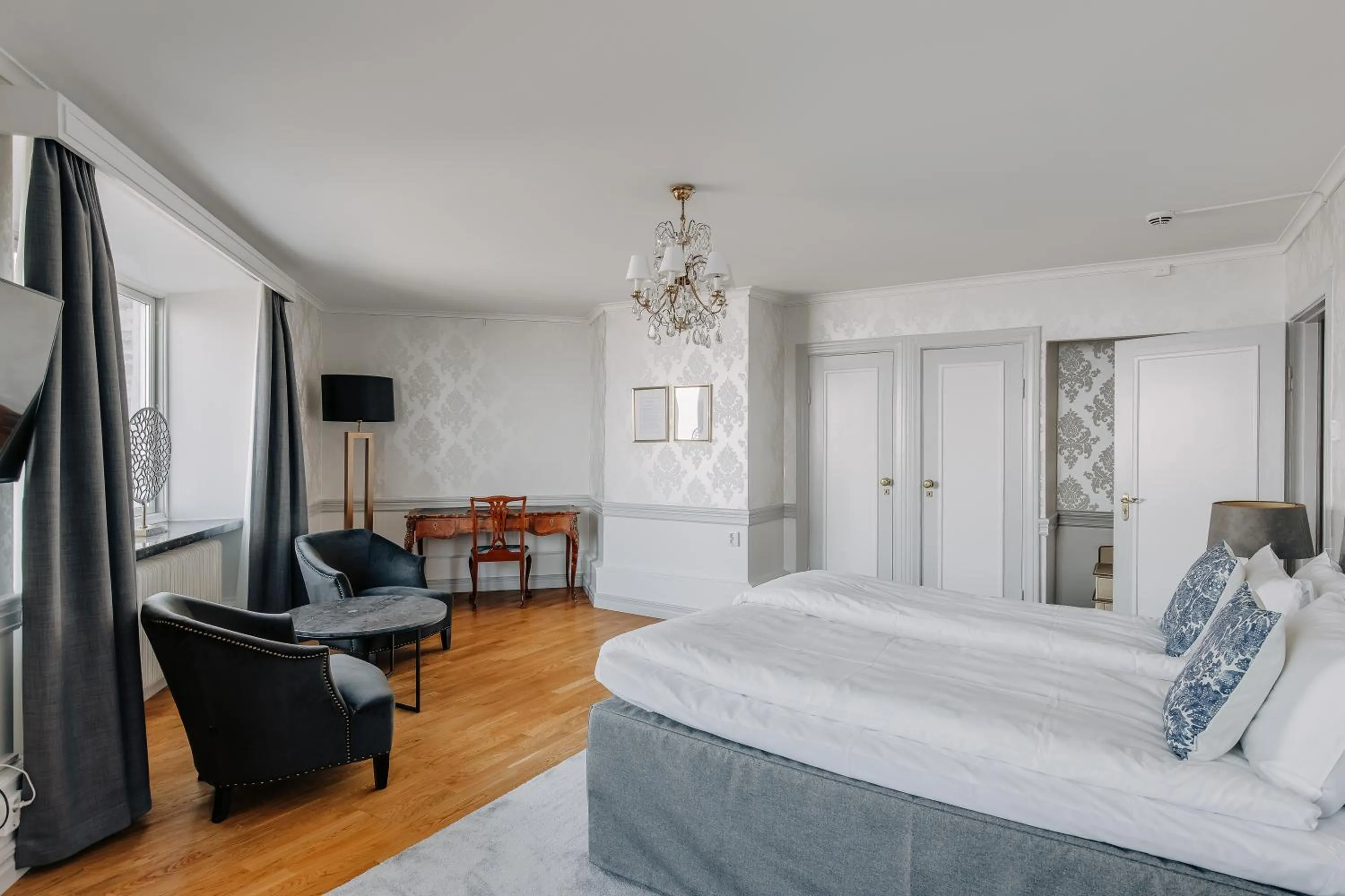 Living room, Bed in Hotel Gyllene Uttern