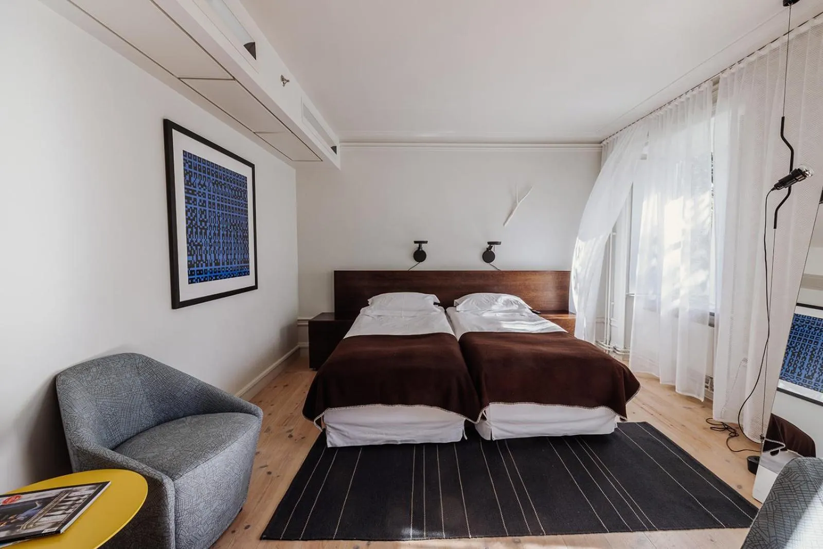 Bed in Hotel Skeppsholmen, Stockholm, a Member of Design Hotels