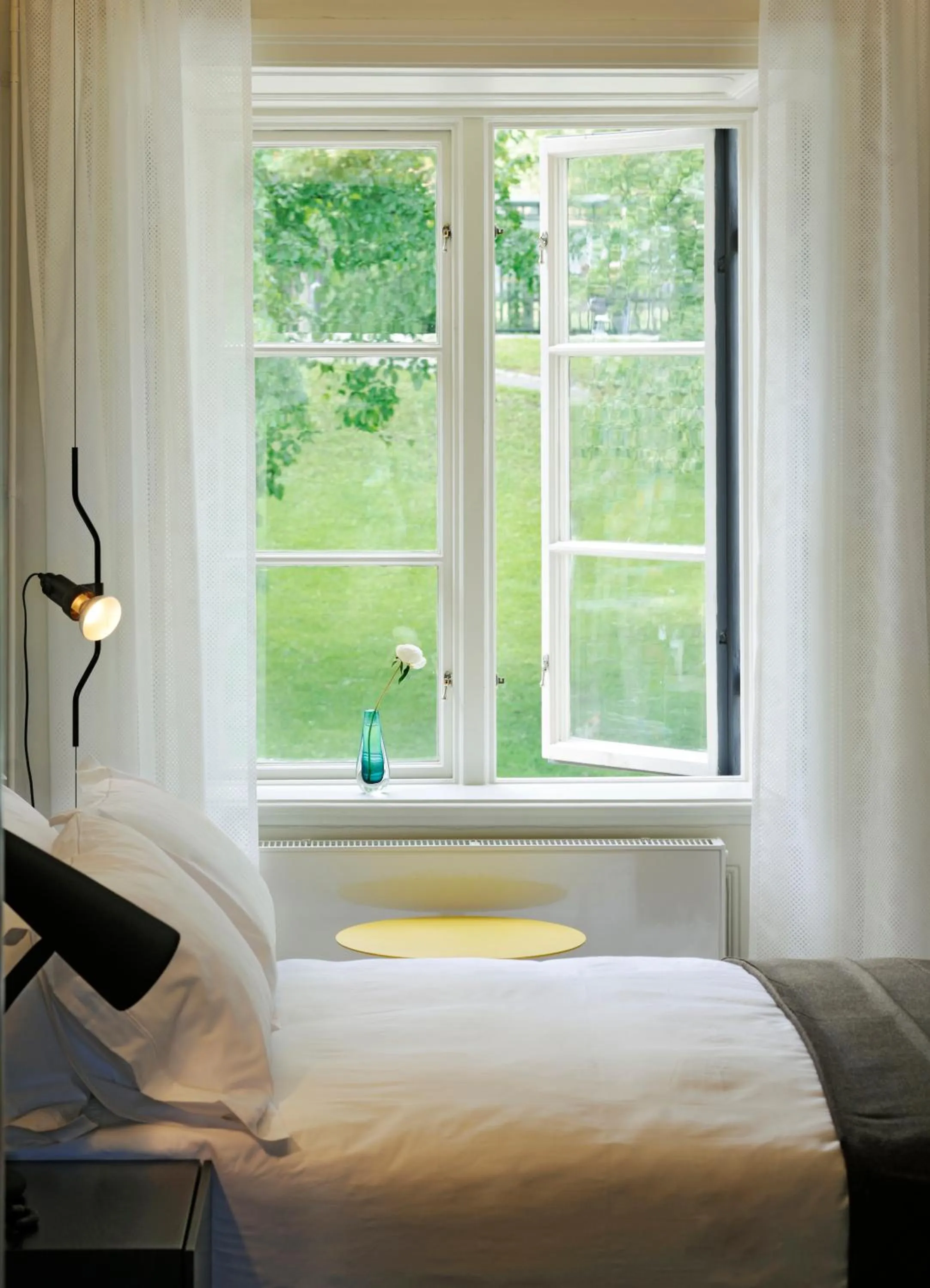 Bed in Hotel Skeppsholmen, Stockholm, a Member of Design Hotels