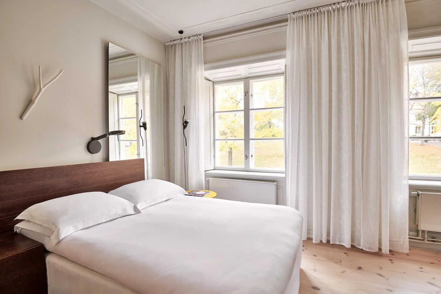 Bed in Hotel Skeppsholmen, Stockholm, a Member of Design Hotels