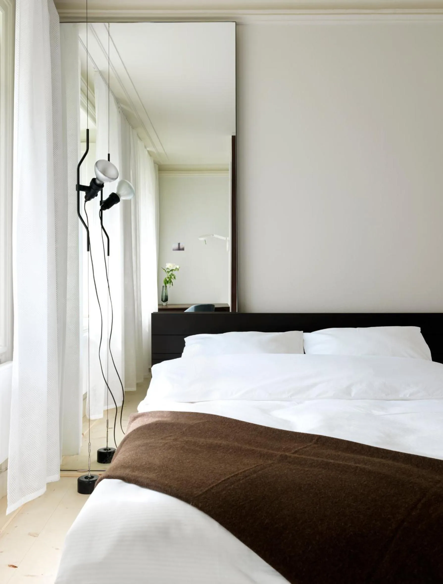 Bed in Hotel Skeppsholmen, Stockholm, a Member of Design Hotels