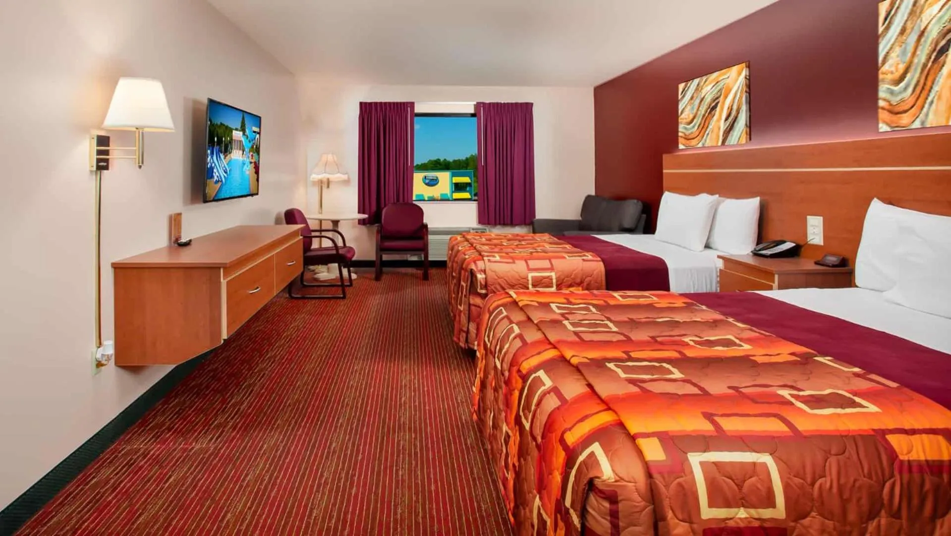 Bed in Grand Marquis Waterpark Hotel & Suites