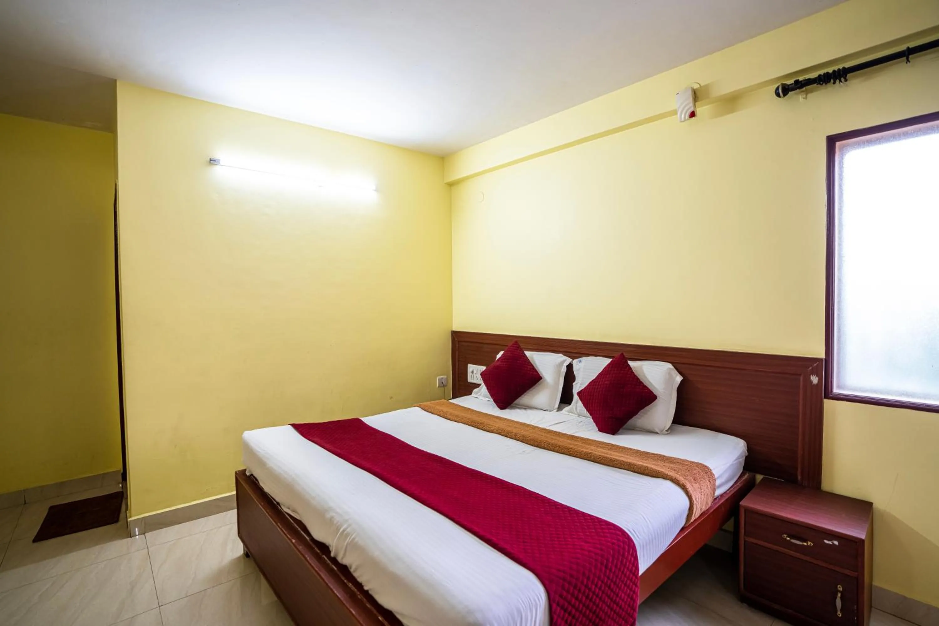 Bed in Hotel Vyshak residency