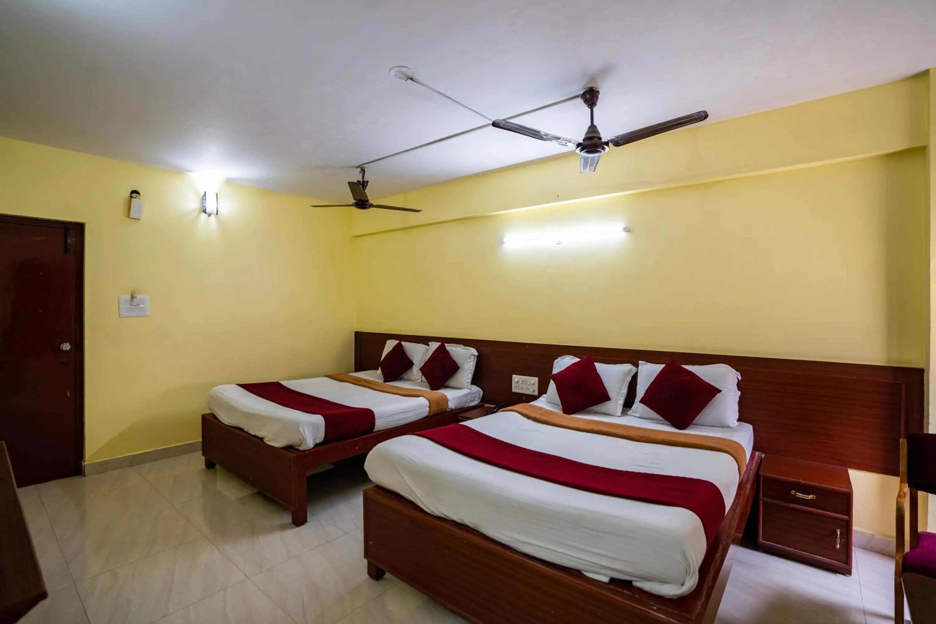 Bed in Hotel Vyshak residency