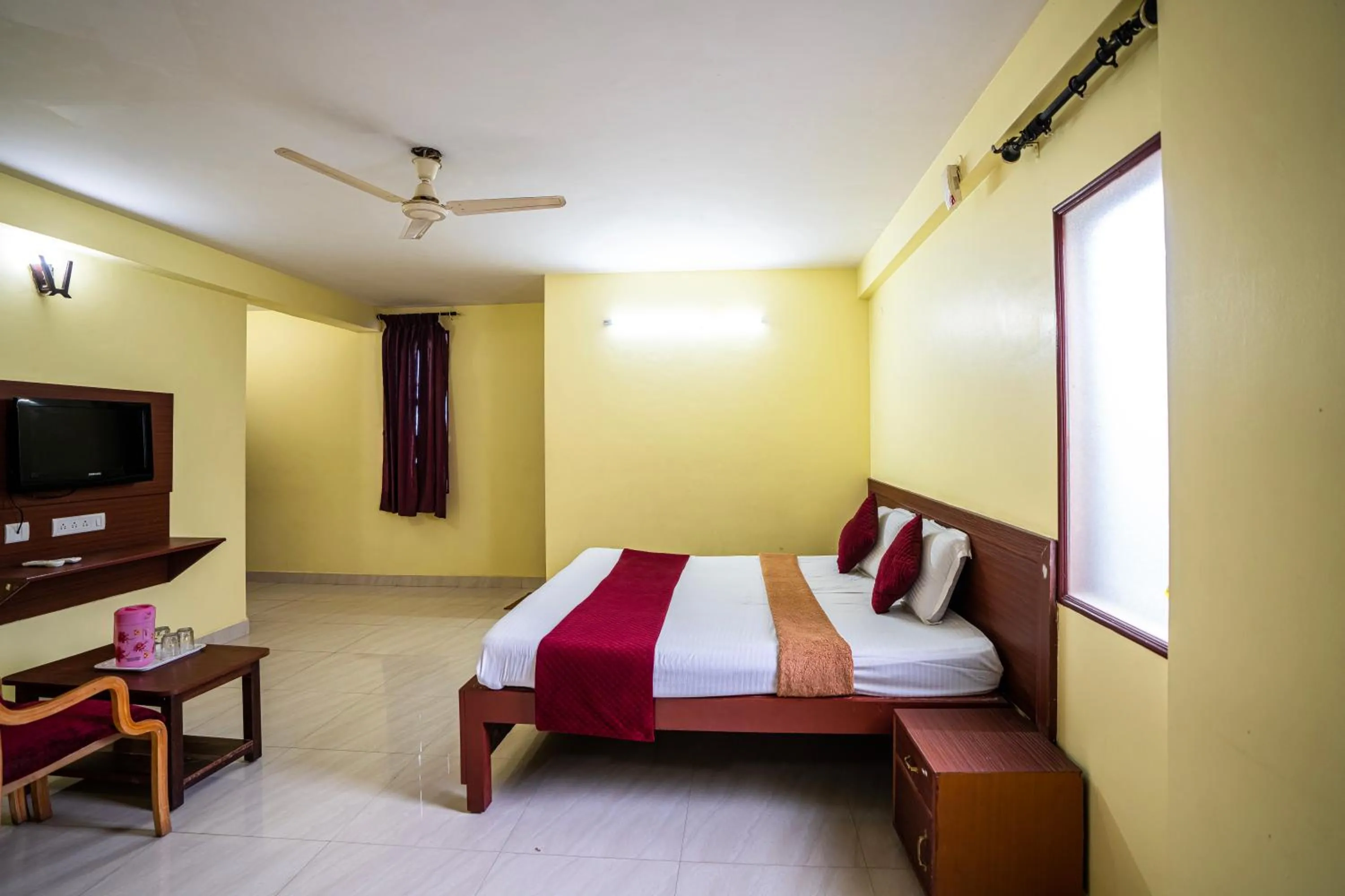 Bed in Hotel Vyshak residency