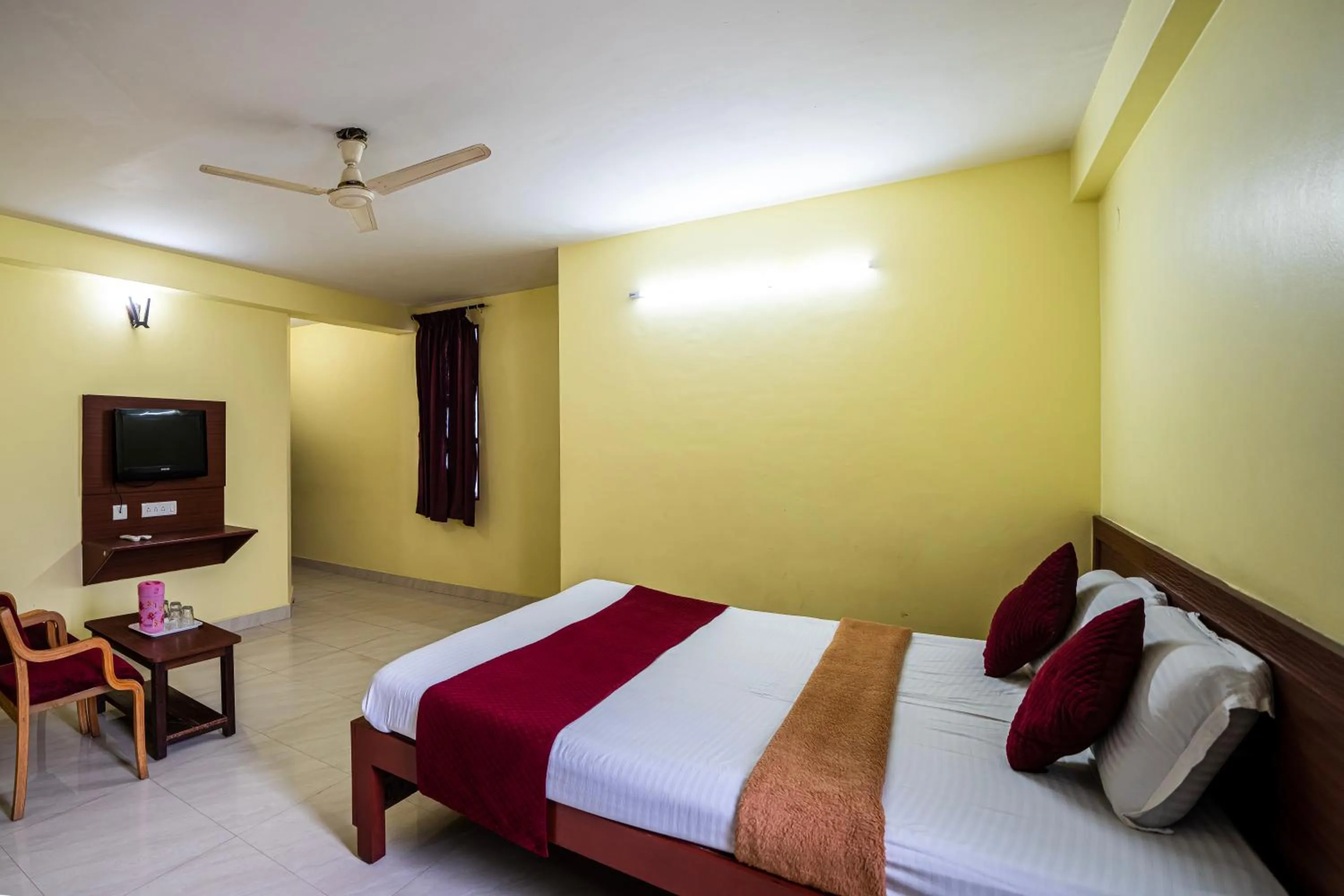 Bed in Hotel Vyshak residency