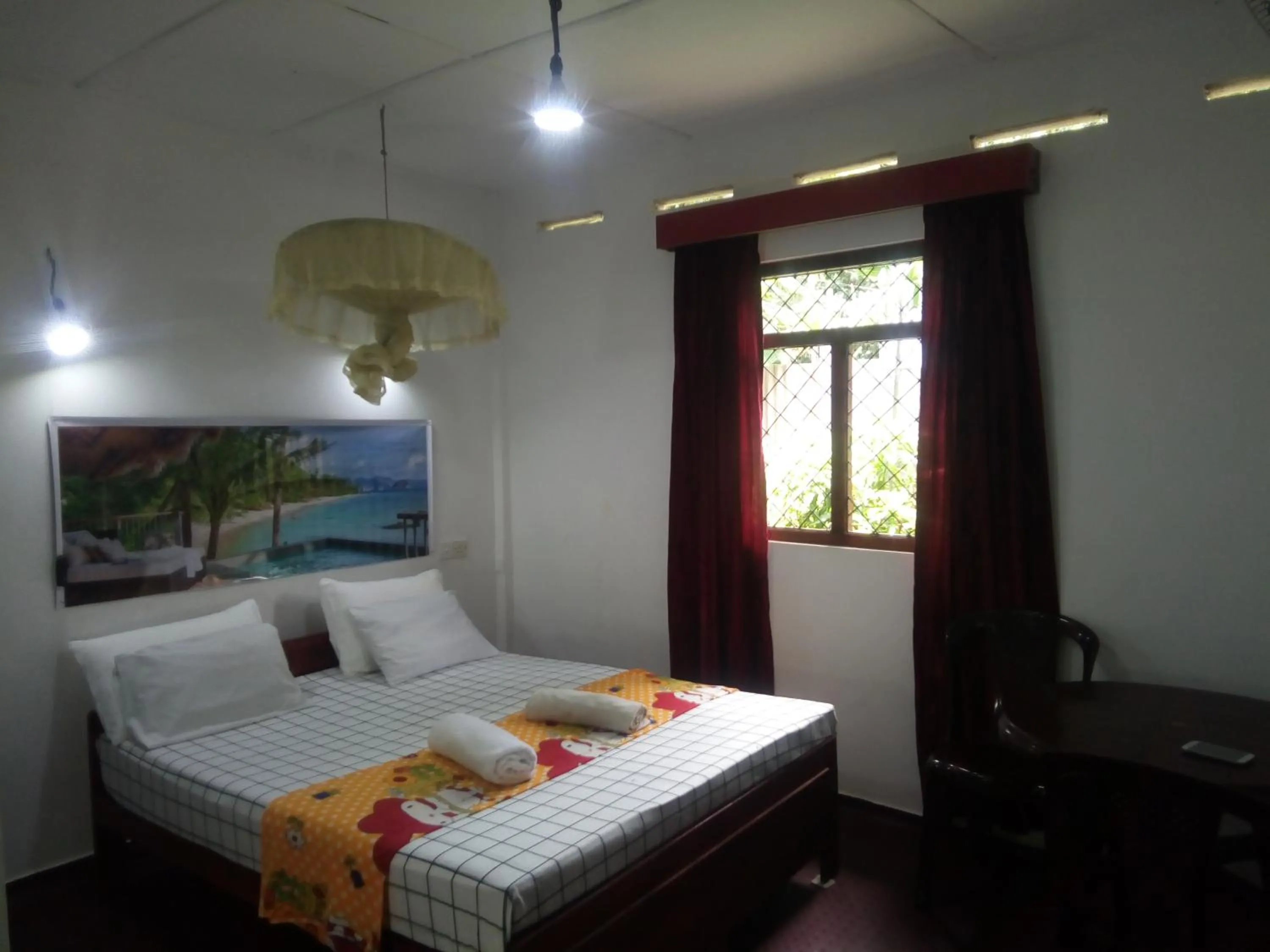 Bed in Erandi Holiday Home