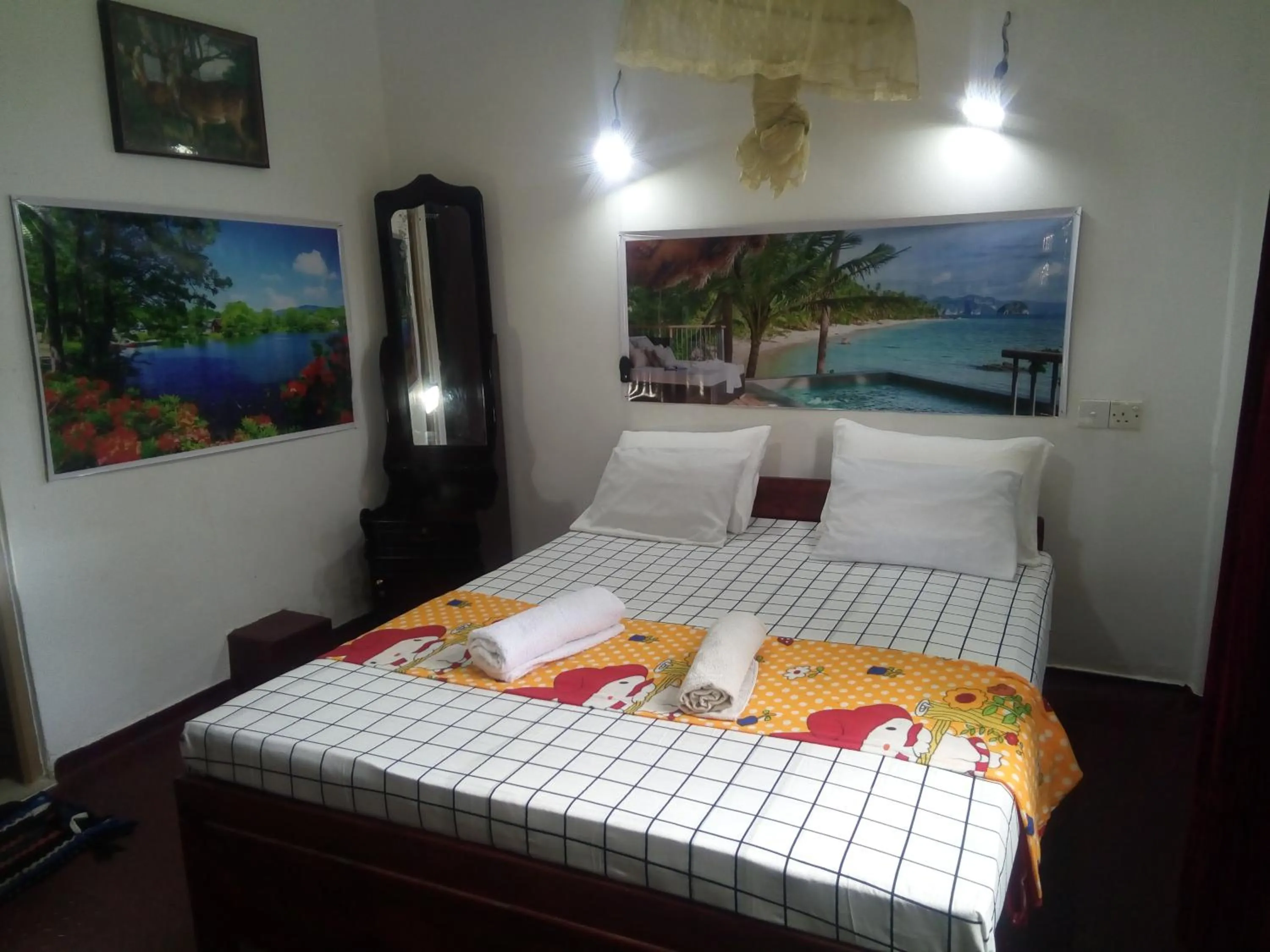 Bed in Erandi Holiday Home