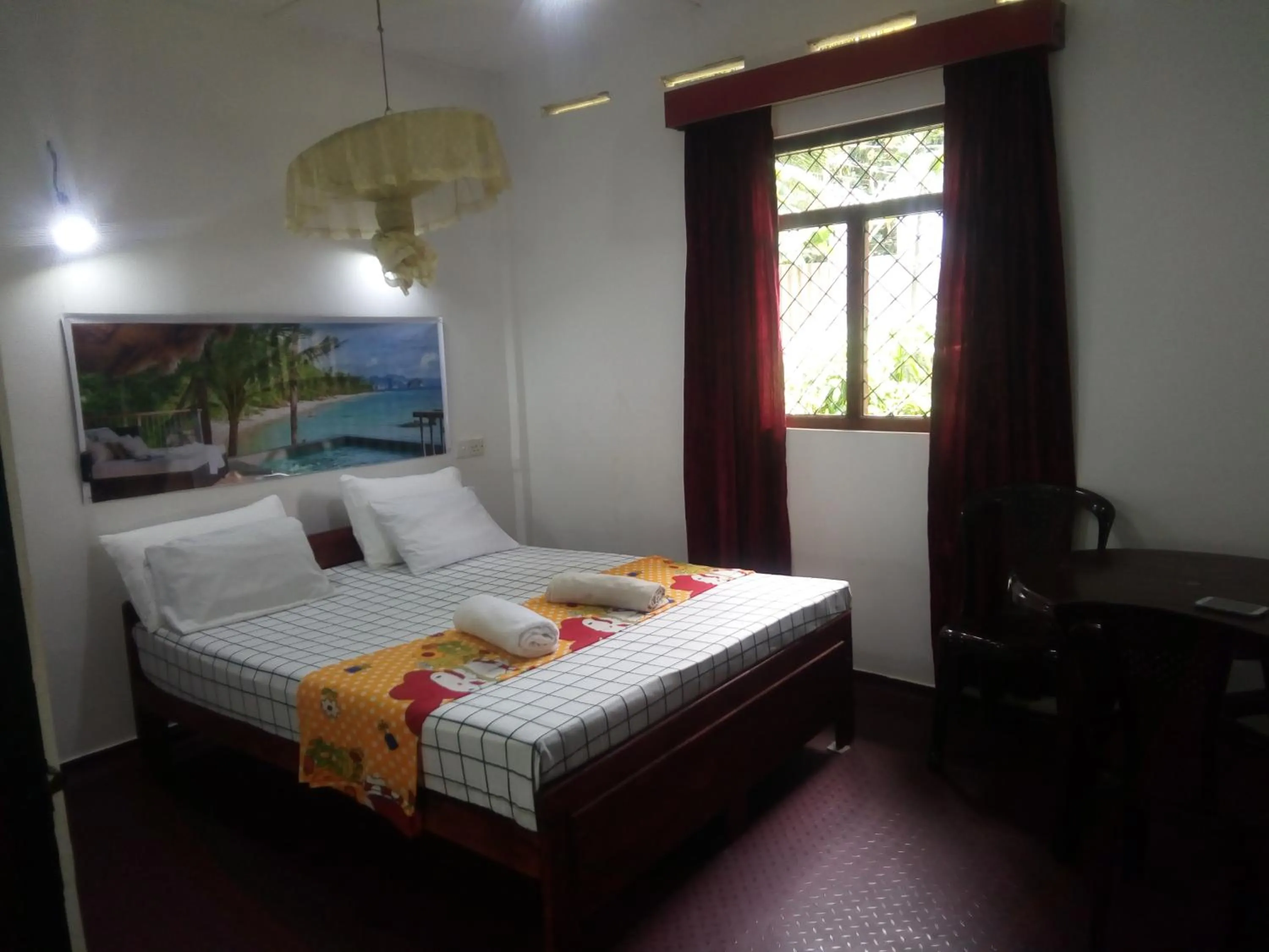 Bed in Erandi Holiday Home
