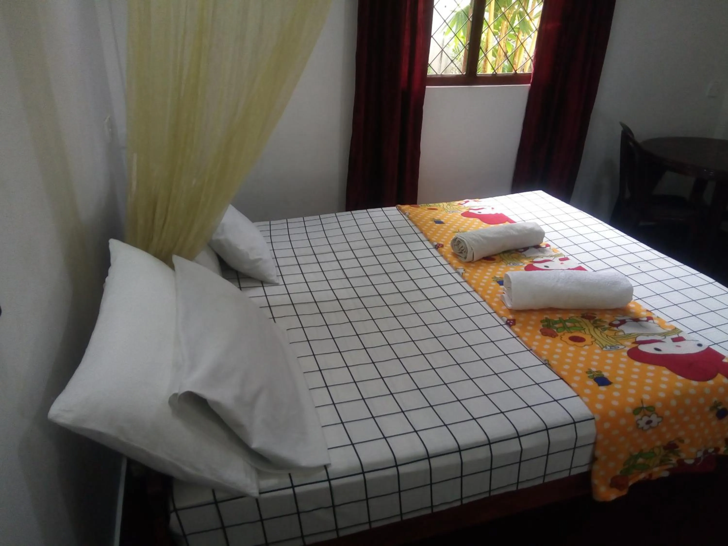 Bed in Erandi Holiday Home