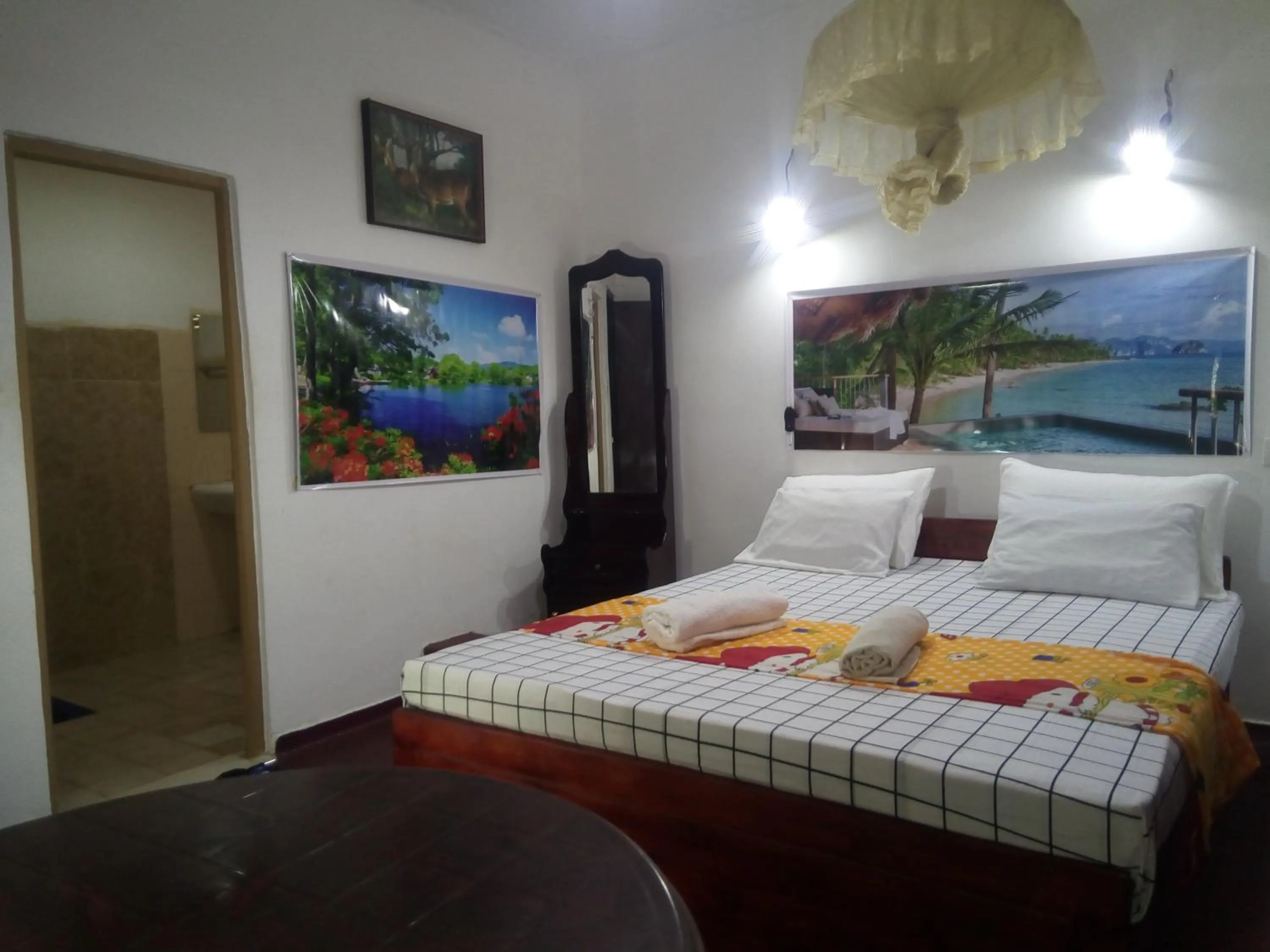 Bed in Erandi Holiday Home