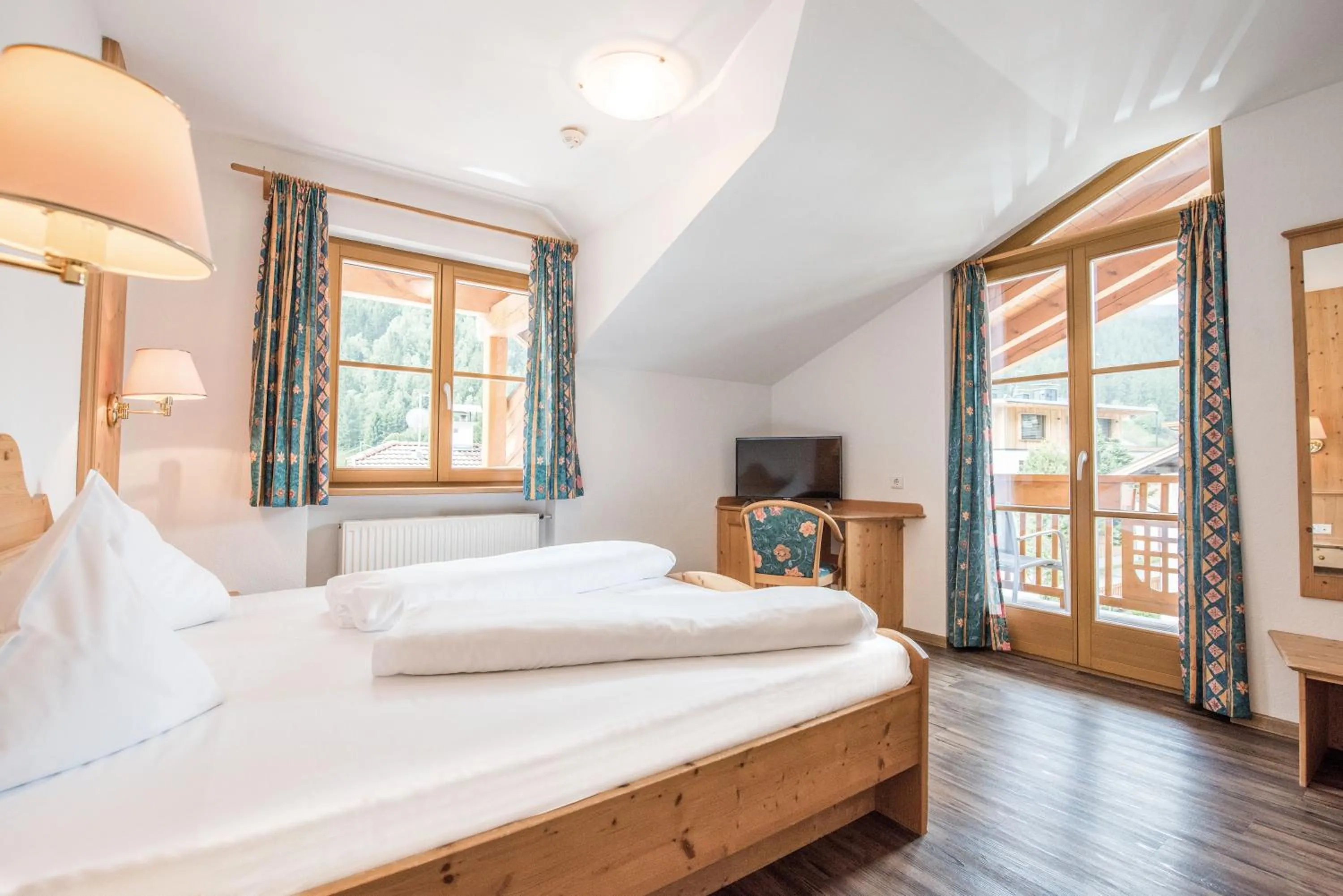 Photo of the whole room, Bed in Hotel Rosenheim