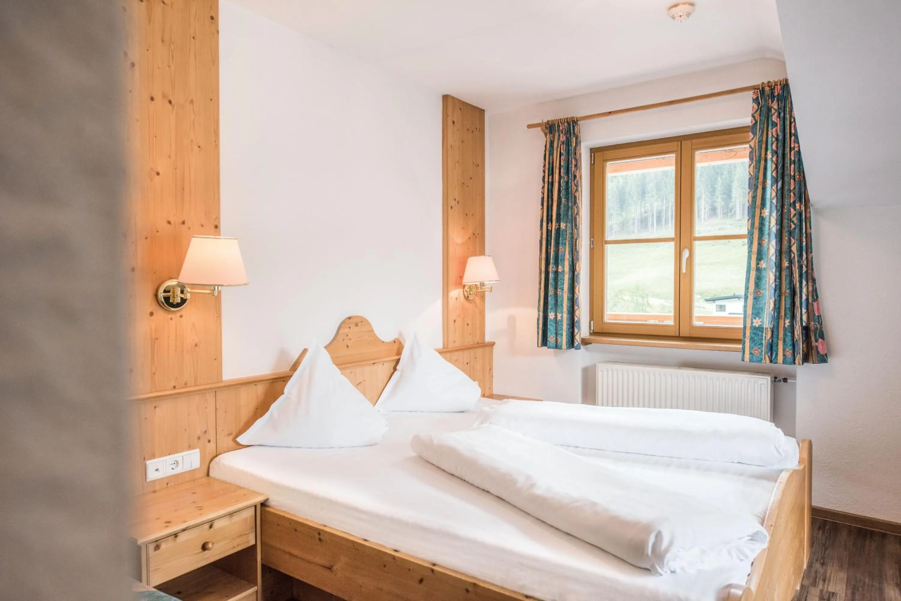 Bed in Hotel Rosenheim