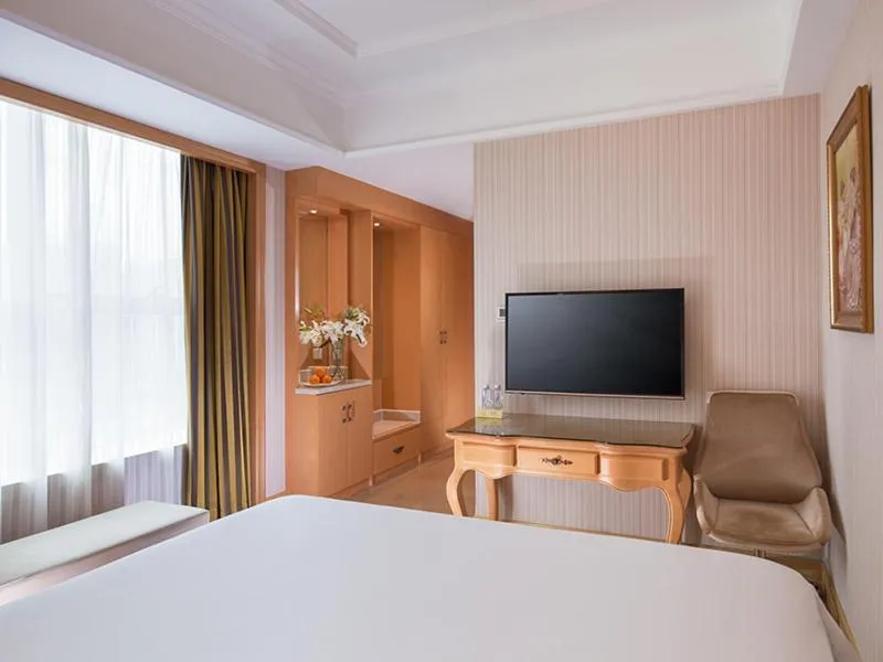 Bed in Vienna International Hotel Shenzhen Qianhai