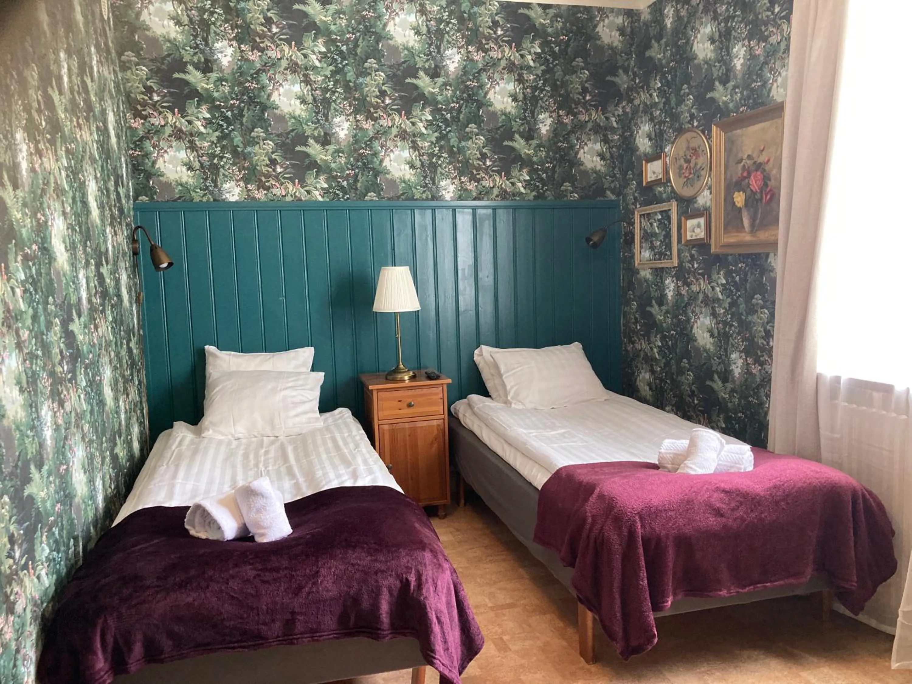 Bed in Madam Blå Hotel