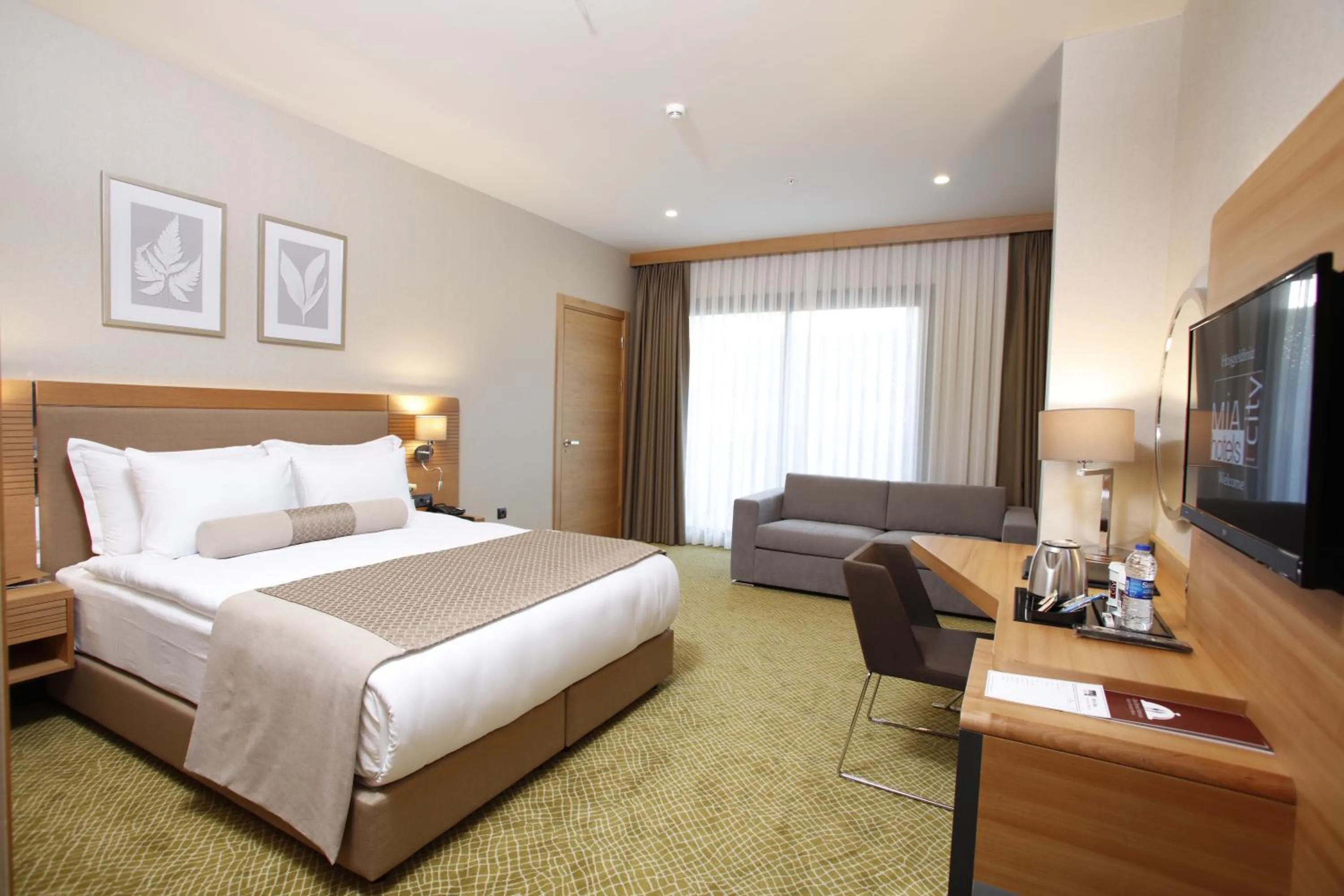 Photo of the whole room, Bed in Mia City Hotel