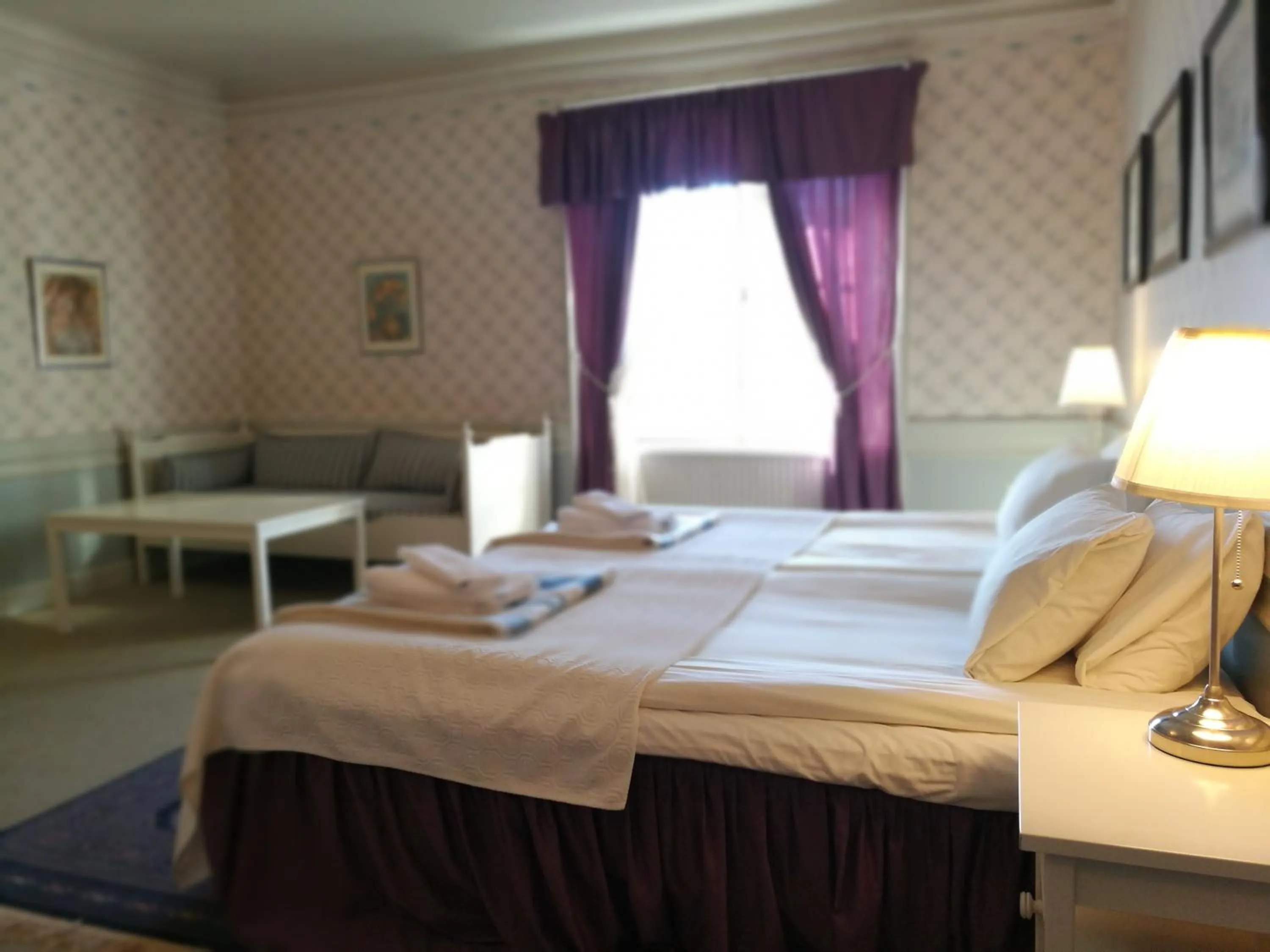 Photo of the whole room, Bed in Wärdshuset Gammel Tammen Österbybruk