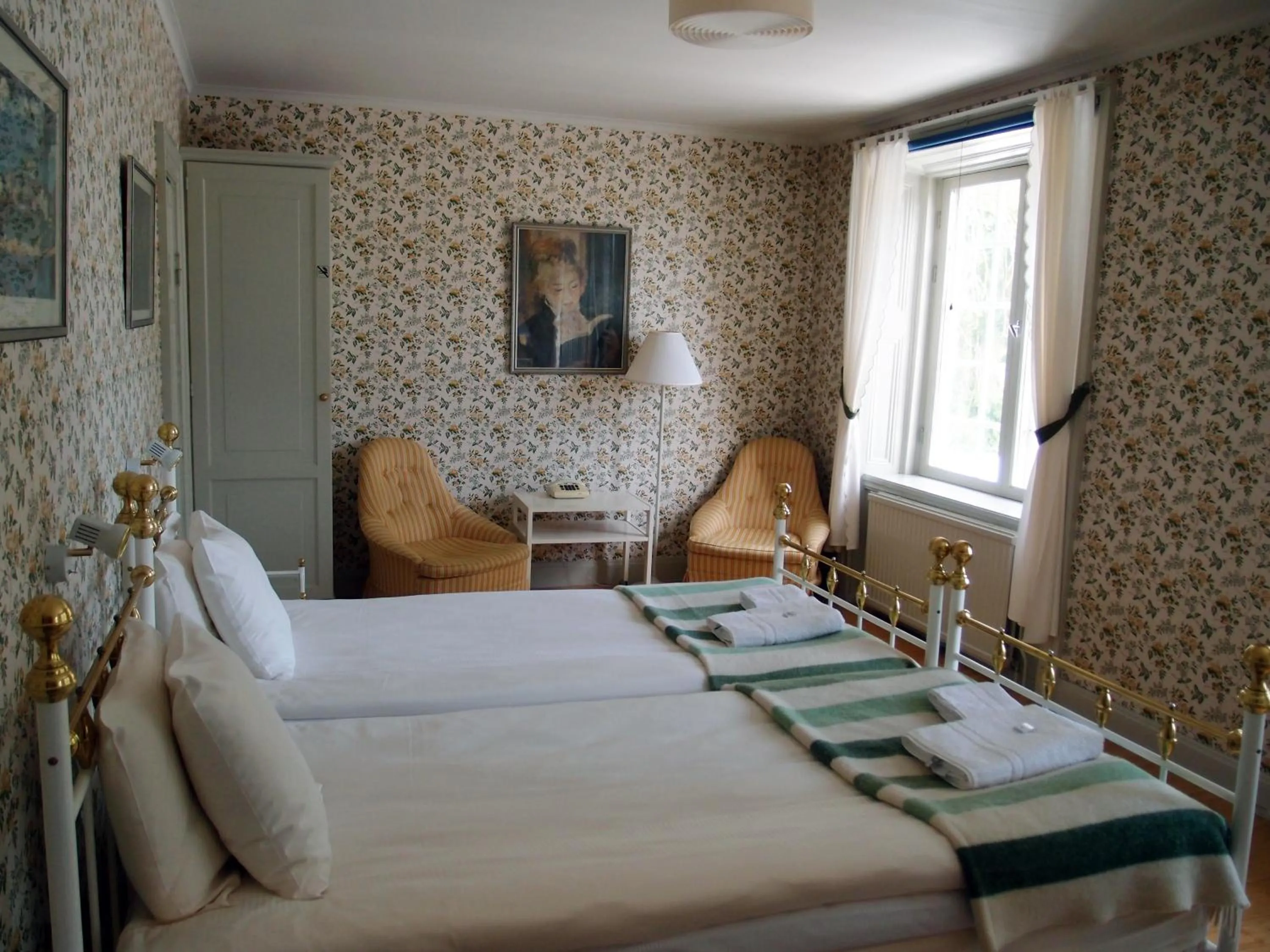 Photo of the whole room, Bed in Wärdshuset Gammel Tammen Österbybruk