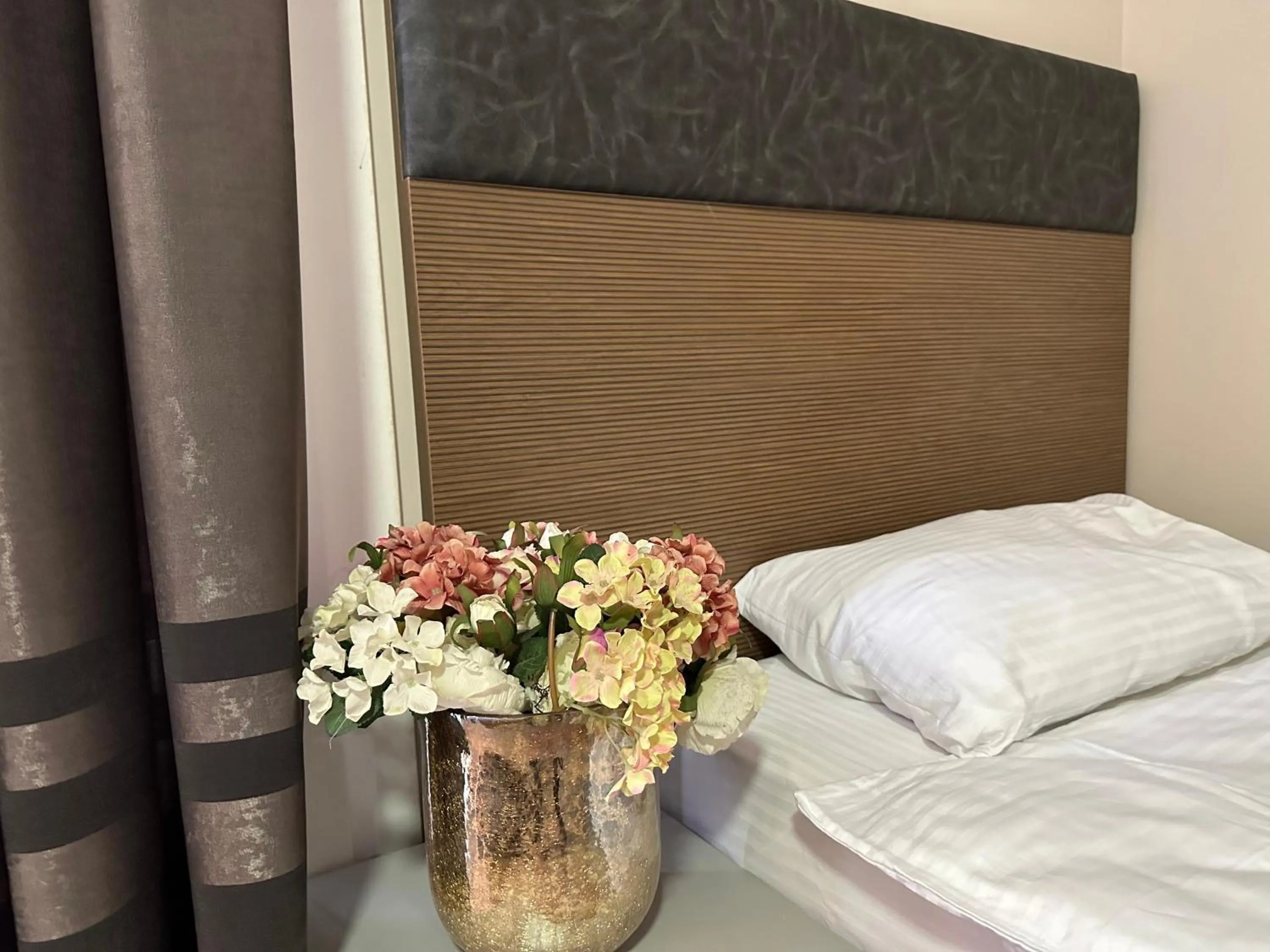 Bed in Niconya Port Suite&Hotel