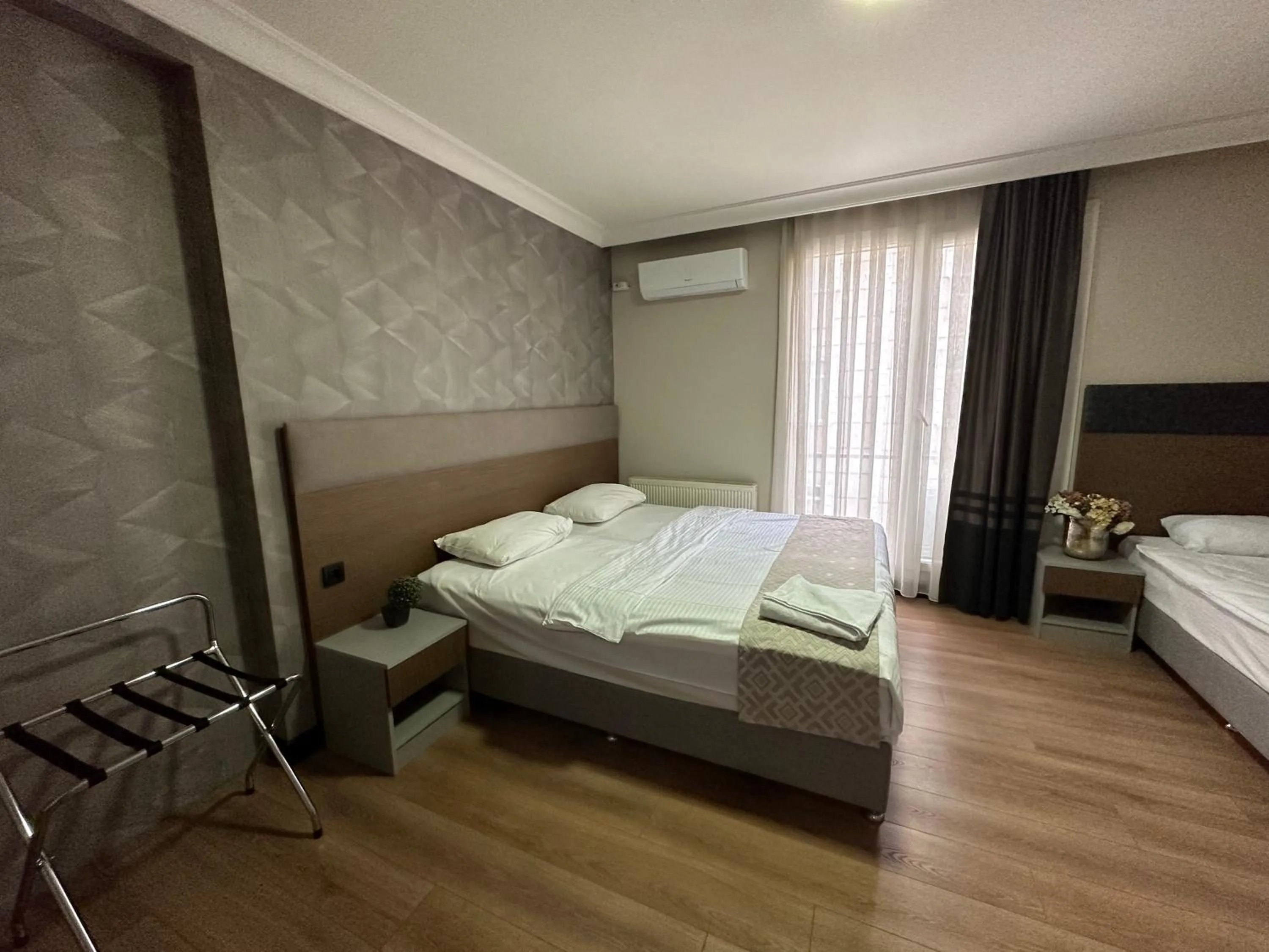 Photo of the whole room, Bed in Niconya Port Suite&Hotel