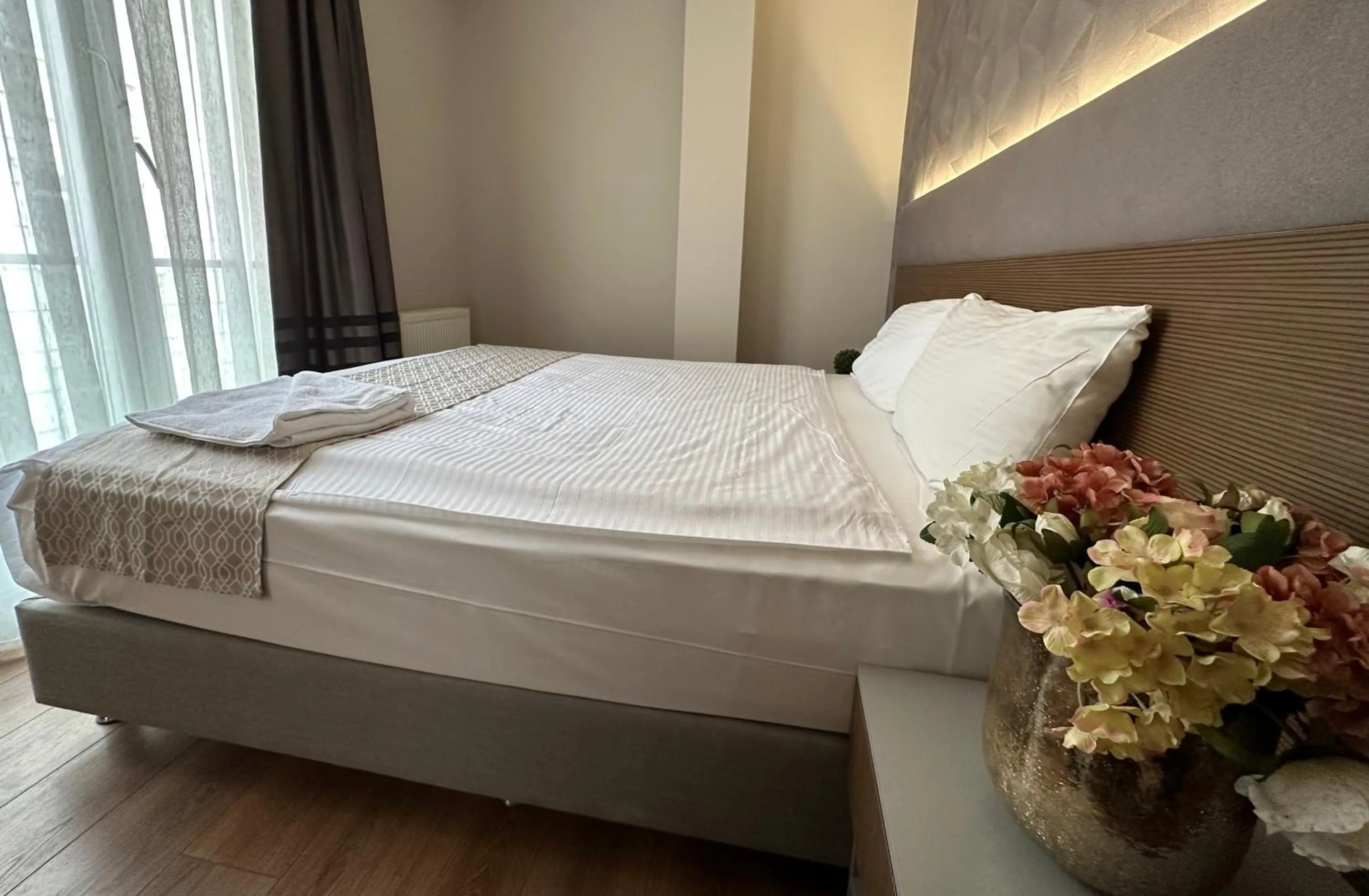 Bed in Niconya Port Suite&Hotel