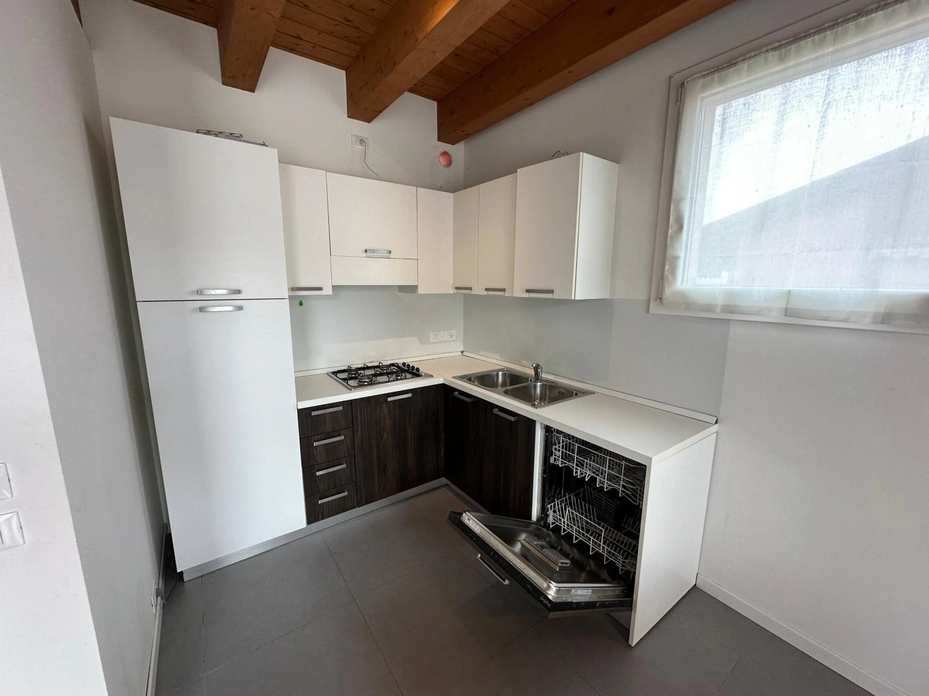 Kitchen or kitchenette in Attico Concordia - Agenzia Cocal