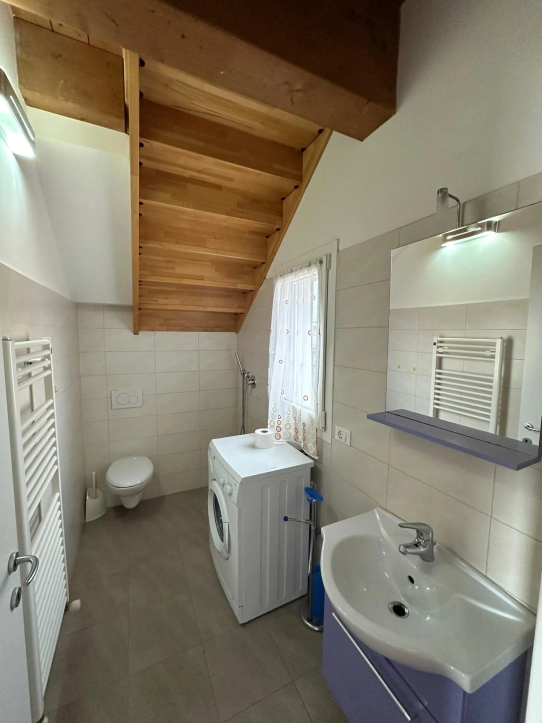 Toilet in Attico Concordia - Agenzia Cocal