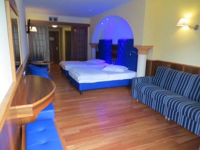 Bed in Hotel Alexander