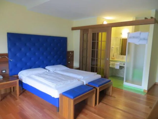 Bed in Hotel Alexander