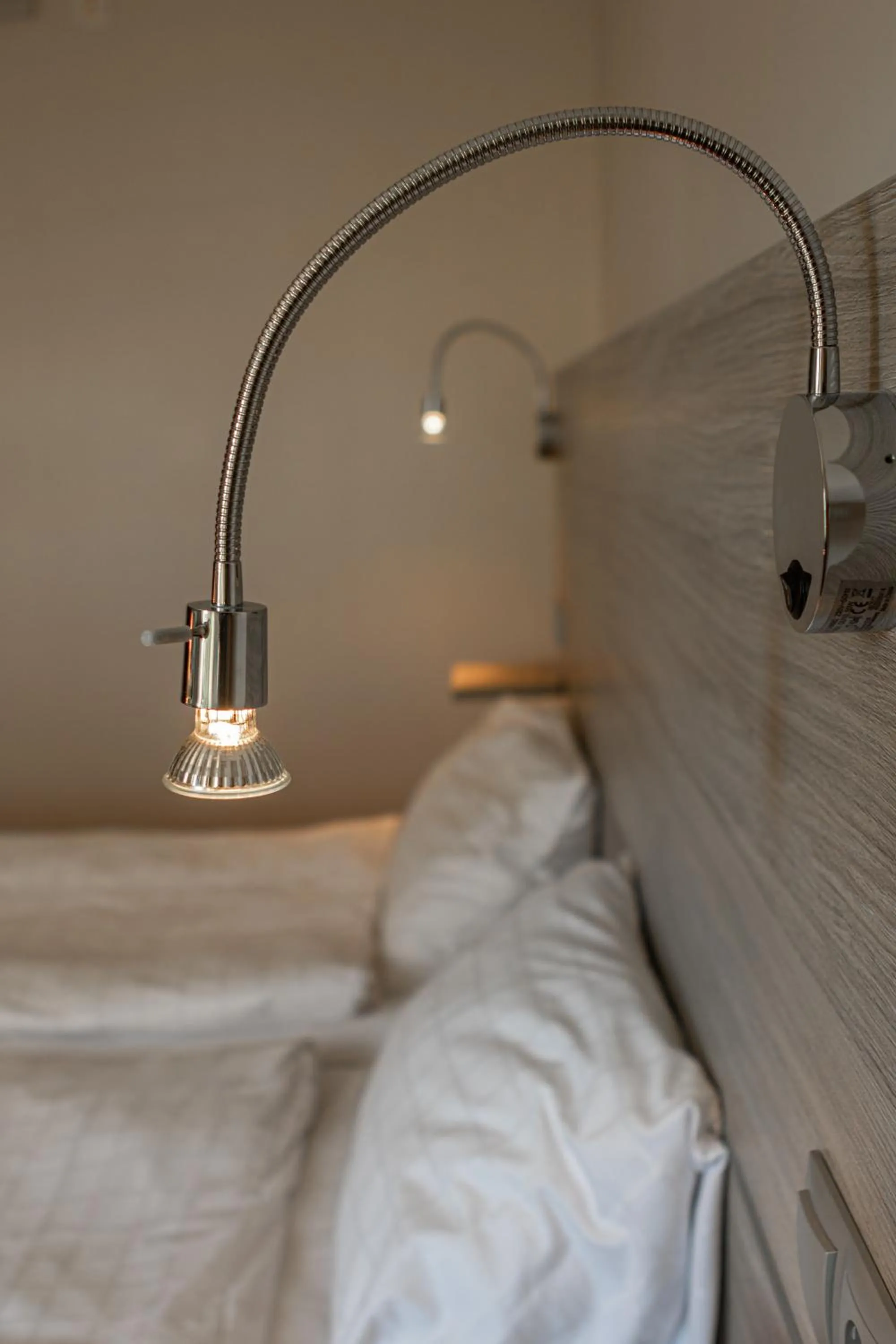 Bed in First Hotel Olofström