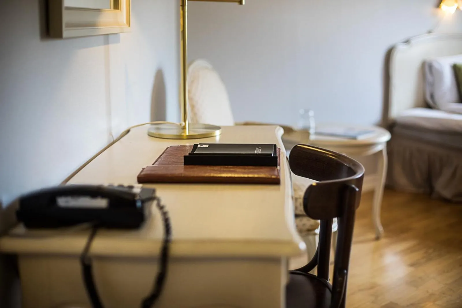 Seating area, Bed in First Hotel Olofström