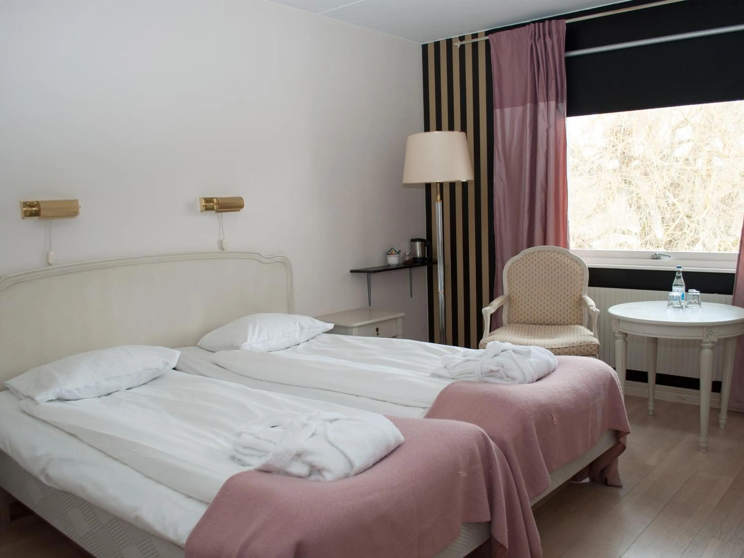 Bed in First Hotel Olofström