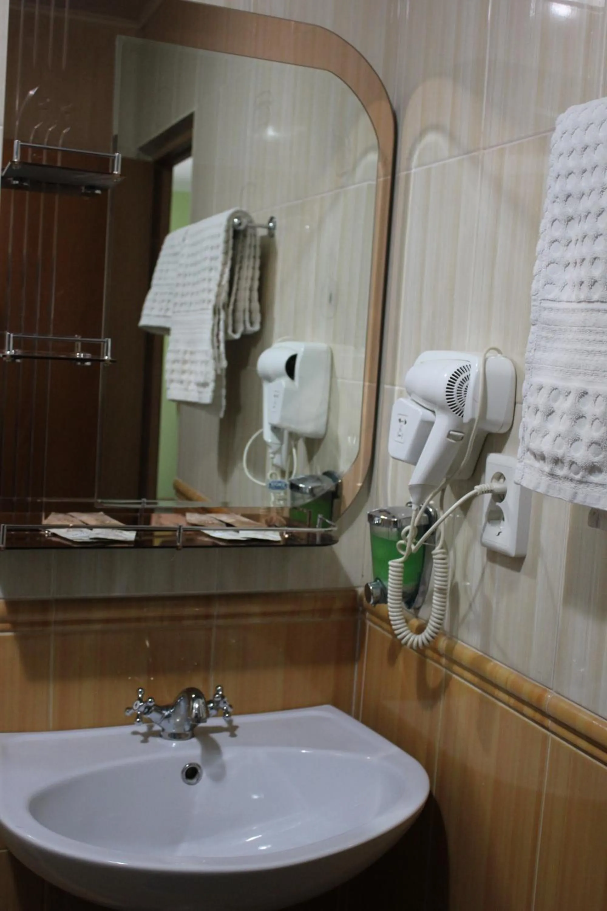 Bathroom in Three Dolphins Hotel