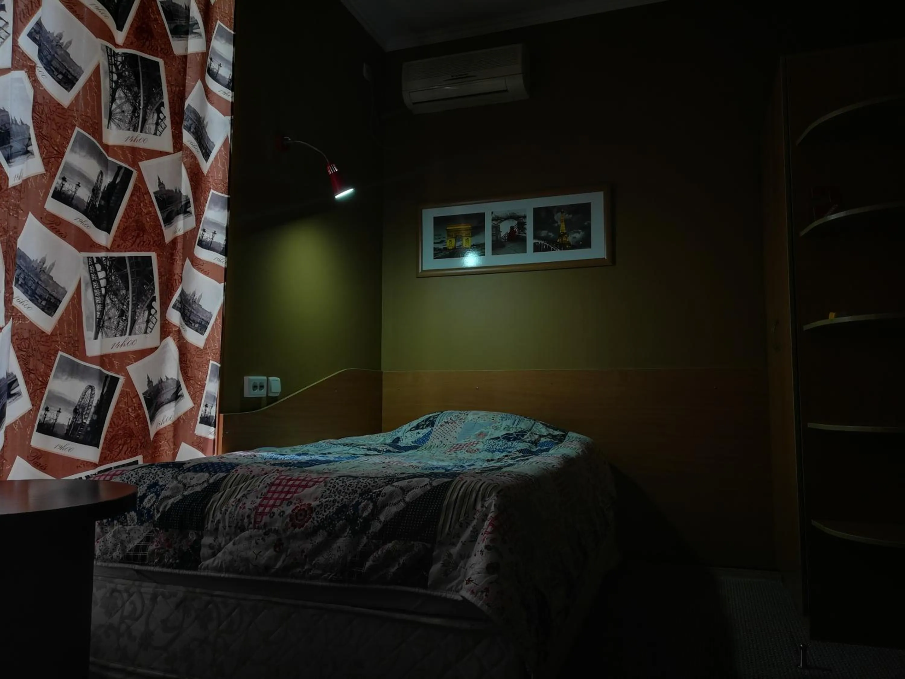 Bed in Three Dolphins Hotel