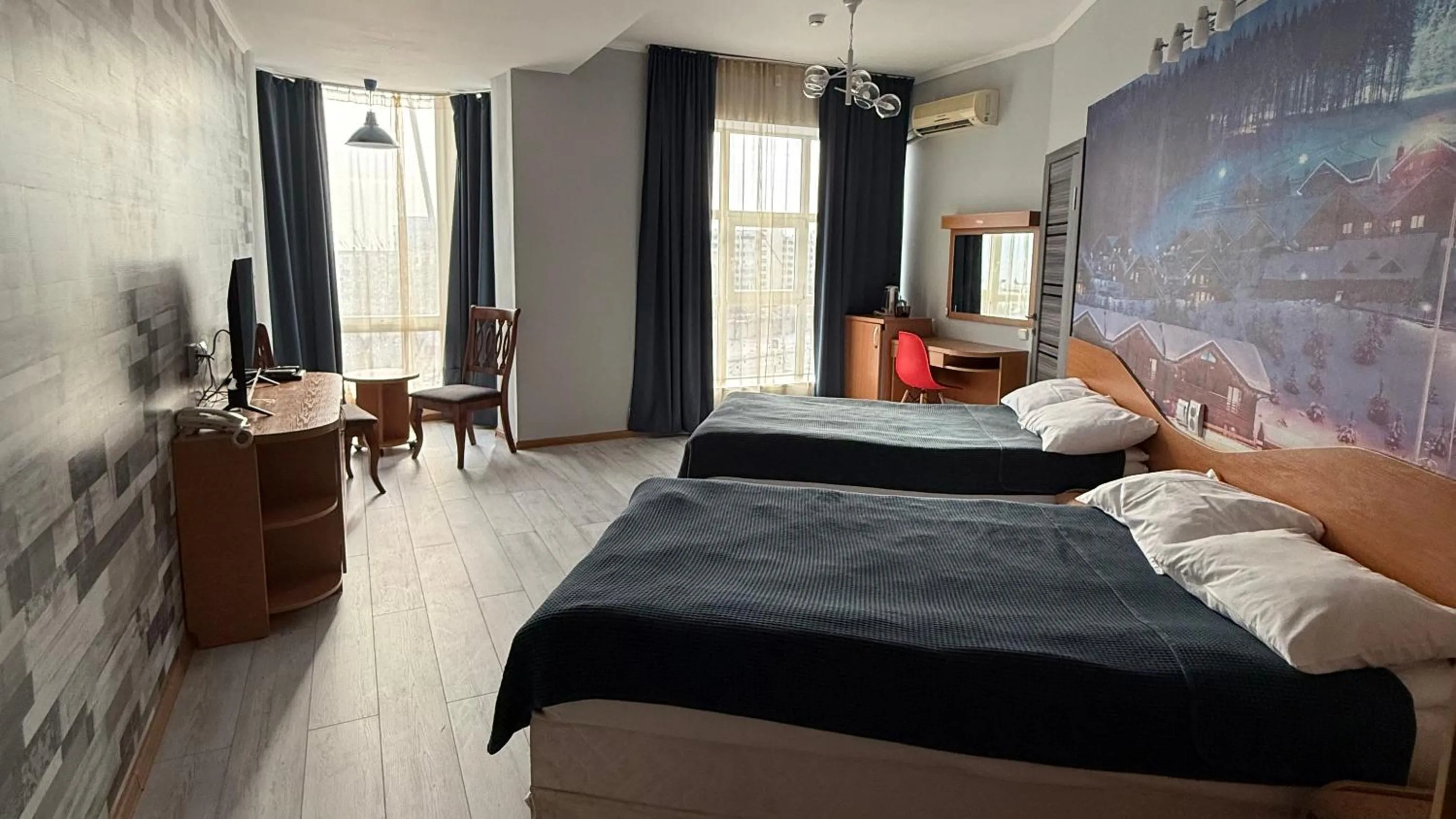 Bed in Three Dolphins Hotel