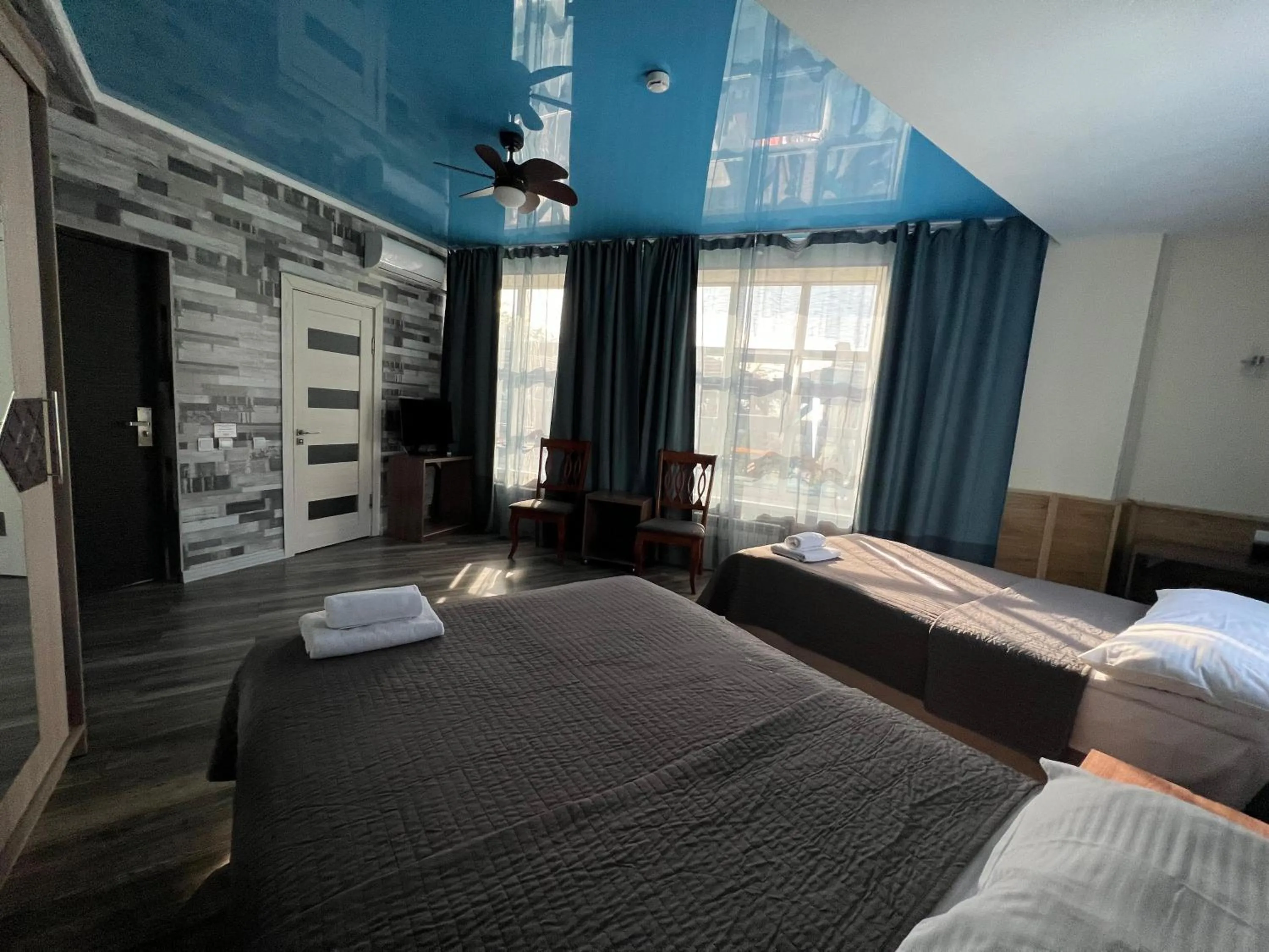 Bedroom, Bed in Three Dolphins Hotel