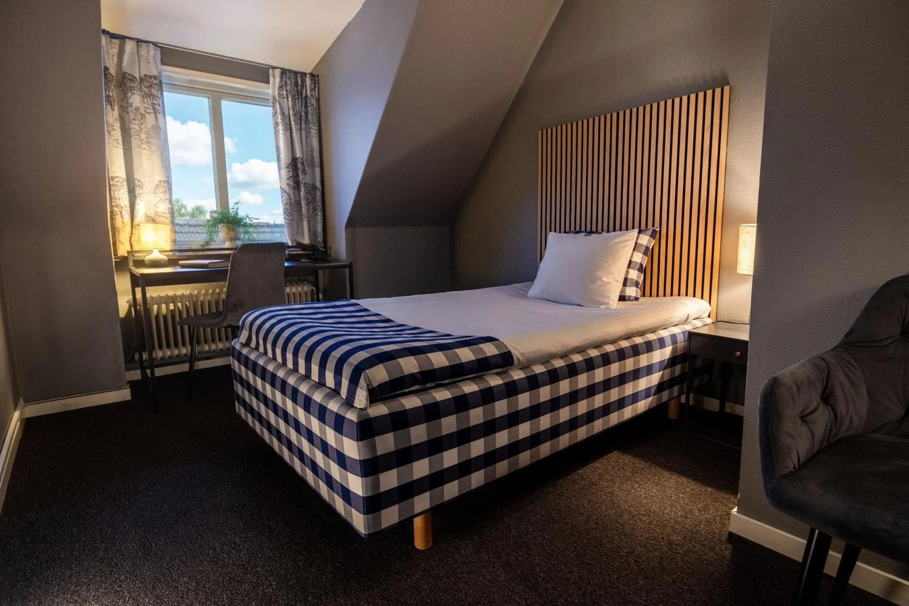 Photo of the whole room, Bed in Hotell Gillet i Köping