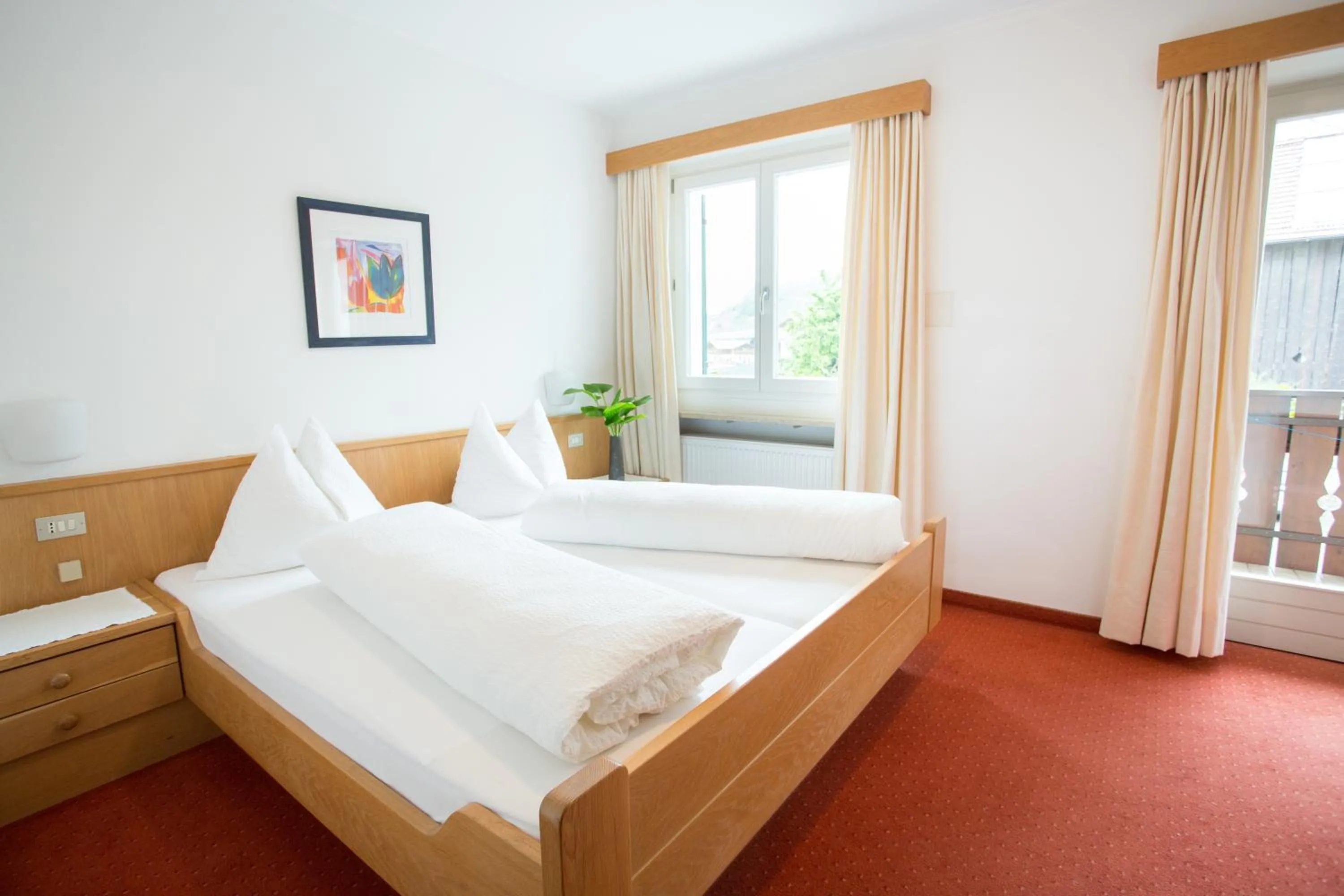 Photo of the whole room, Bed in Garni Pluner