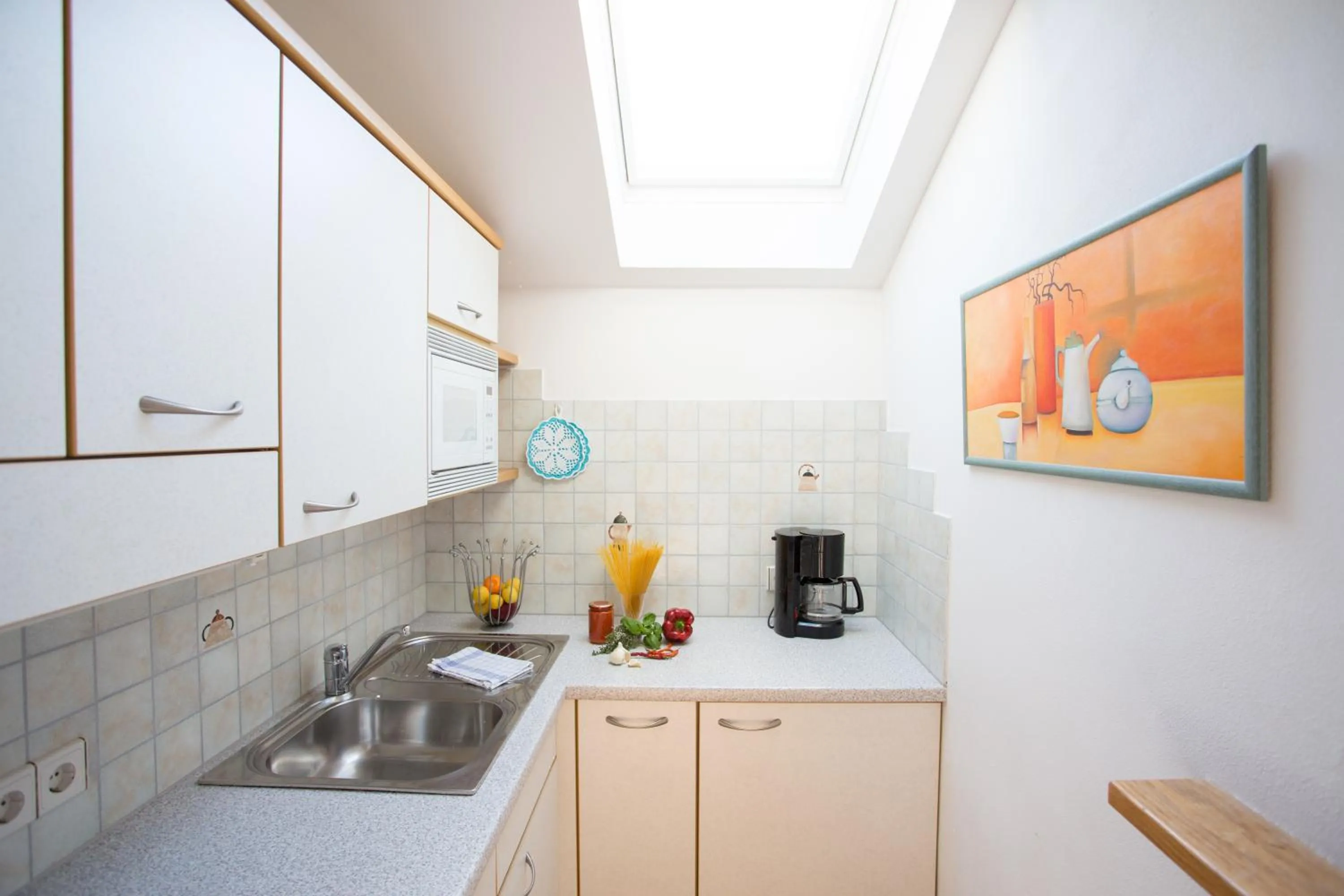 Kitchen or kitchenette in Garni Pluner