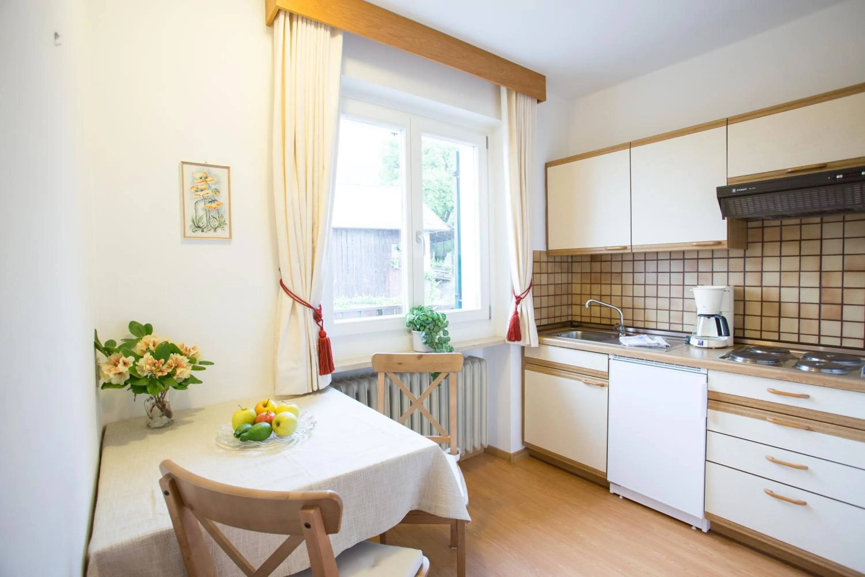 Kitchen or kitchenette in Garni Pluner