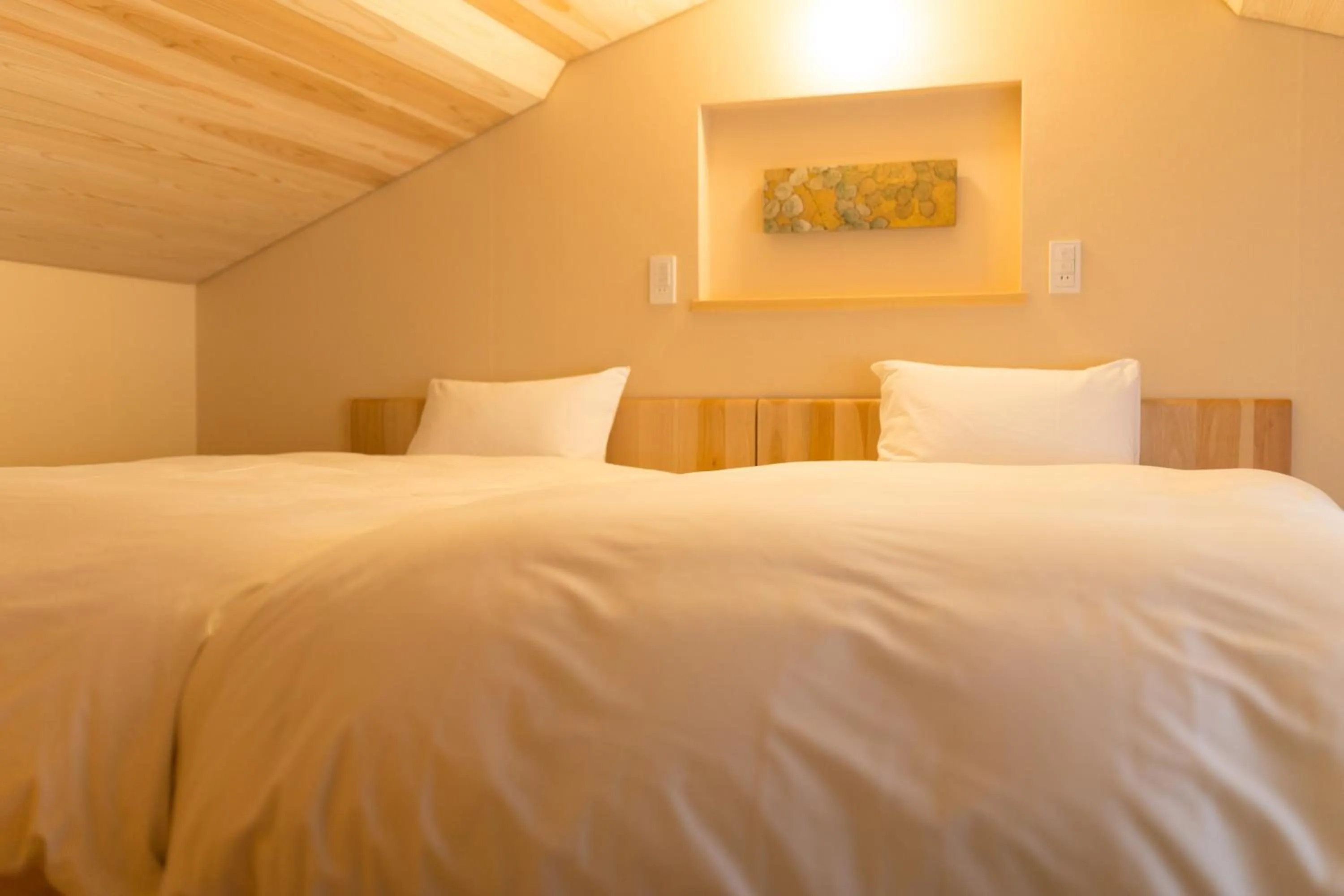 Bed in Kyomachiya Suite Rikyu