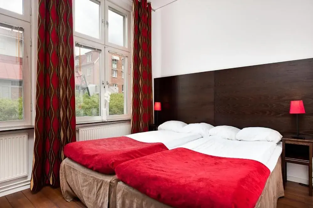 Twin room across the street with private Bathroom in Hotel Jämteborg Twin room across the street with private Bathroom in Hotel Jämteborg