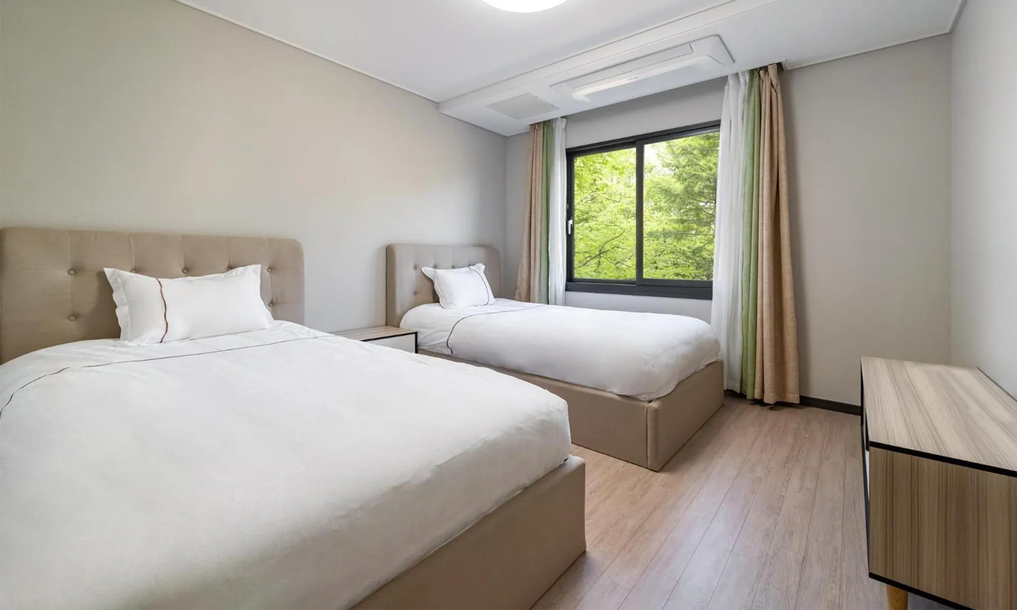 Bed in Kylin Villa resort Jeju