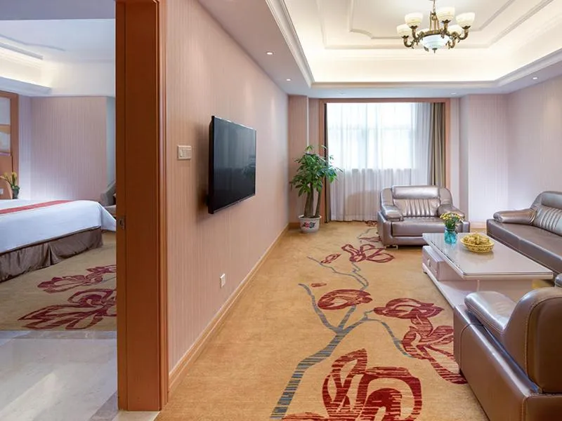 Bed in Vienna Hotel Shenzhen Guangming Guangqiao Road Tianliao