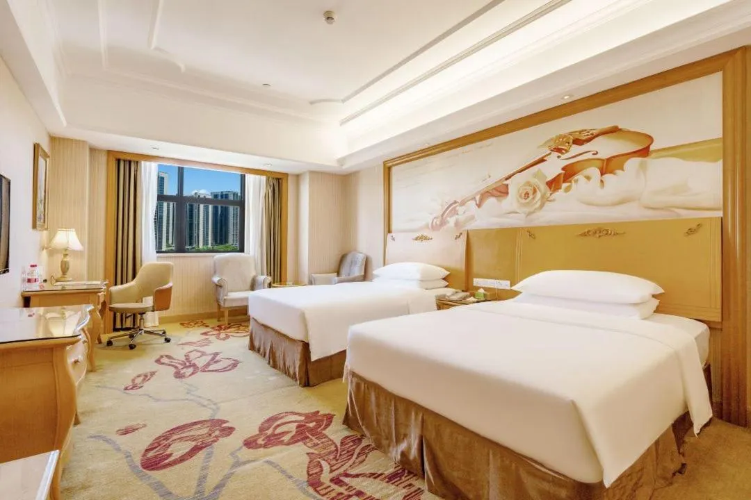 Bed in Vienna Hotel Shenzhen Guangming Guangqiao Road Tianliao